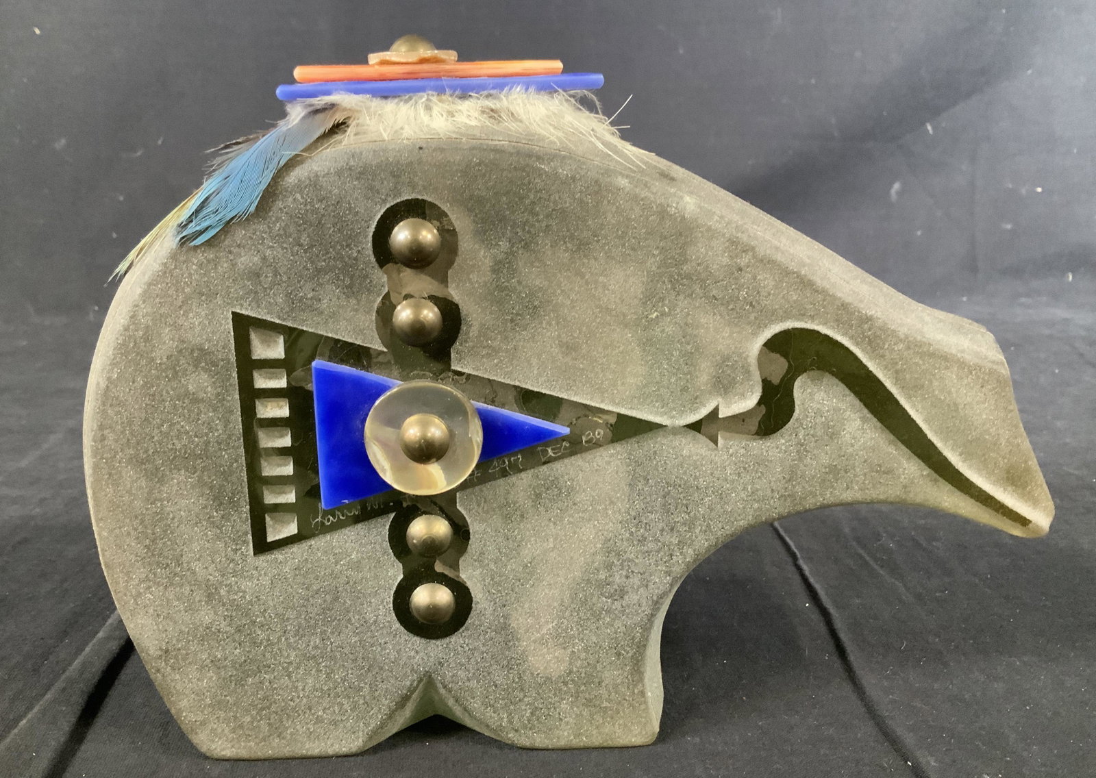 LARRY M FULLER Signed Glass Sculpture 1989: LARRY M FULLER Signed Glass Sculpture 1989, signature reads ‘Larry M Fuller’, inscription reads ‘#497 Dec 89’, subject an abstracted bear with attached composite materials and feathers, measur