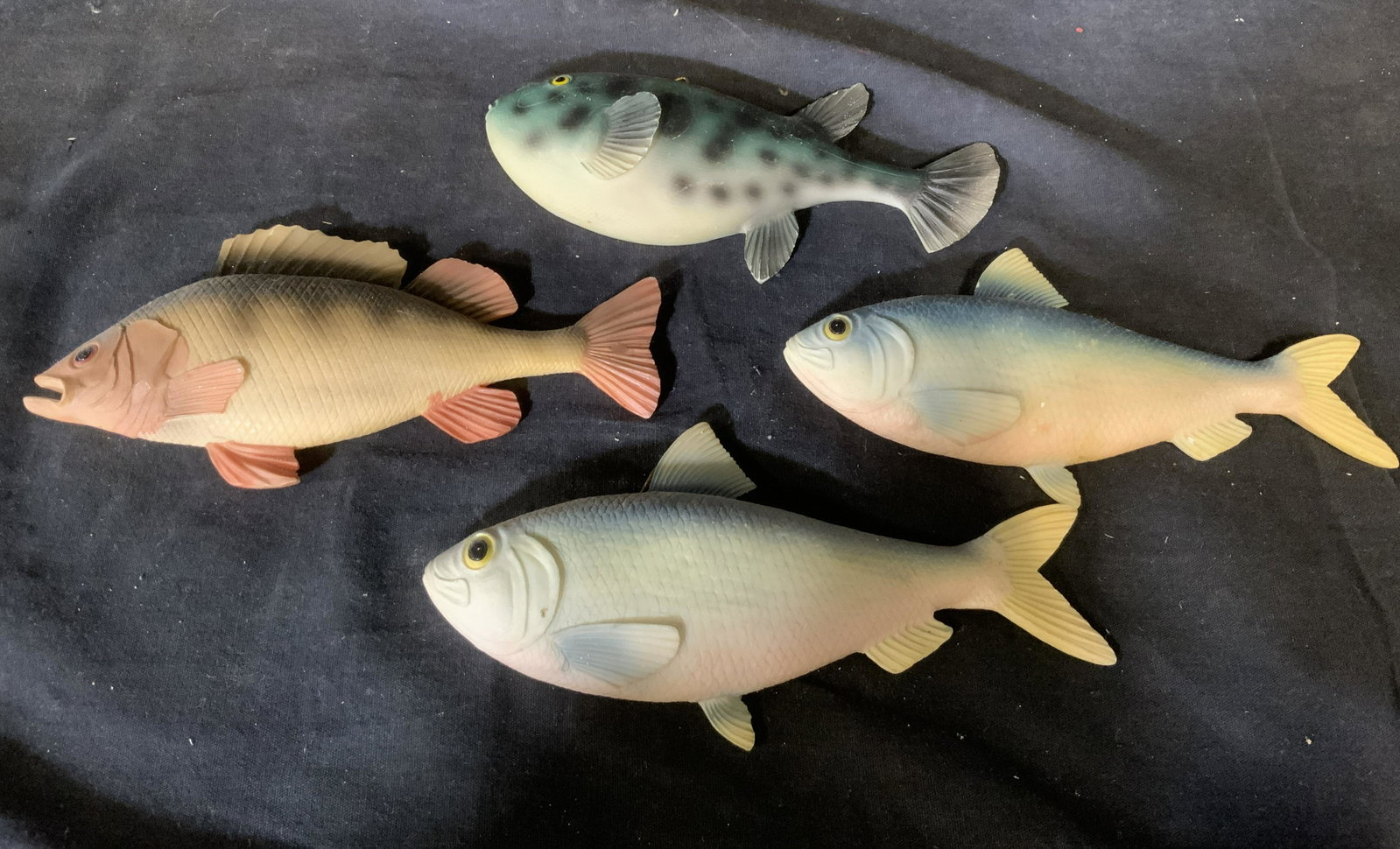 Group Lot 4 Composite Wall Fish: Group lot 4 composite wall fish, most have label to reverse that reads ‘Made in China’, all four are painted and made in their own design and style, largest of the four measures 7.5 inches in leng