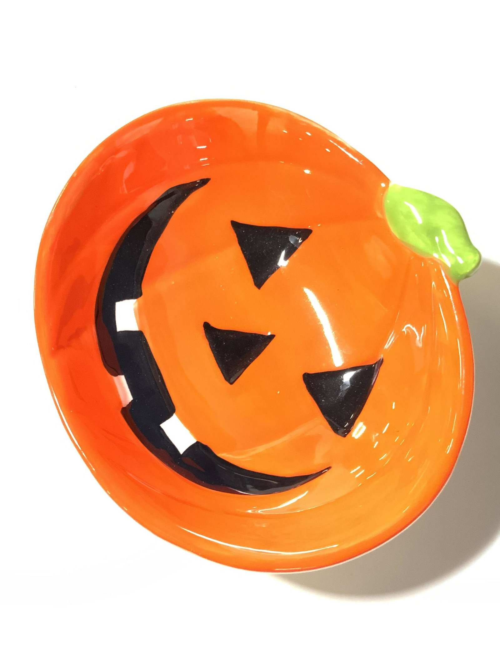 Grp Lot 10 Vintage & Modern Halloween Kitchenware: Ten pieces of pumpkin themed kitchen and home accents. Pieces are crafted from glass and ceramics. Lot includes mugs, vessels, bowls, decor, and more. All pieces are orange hued. Largest Approx. 7H x 