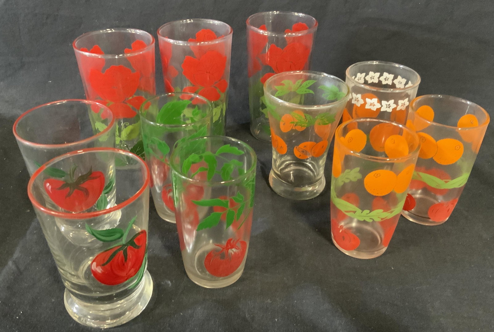 Retro Collection 11 Painted Glass Cups Ktichenalia: Collection 11 painted glass cups, 3 are designed with roses 4 with tomatoes and 4 with oranges, the rose glasses measure 5 inches at tallest point, no apparent inscriptions or markings to any, some we