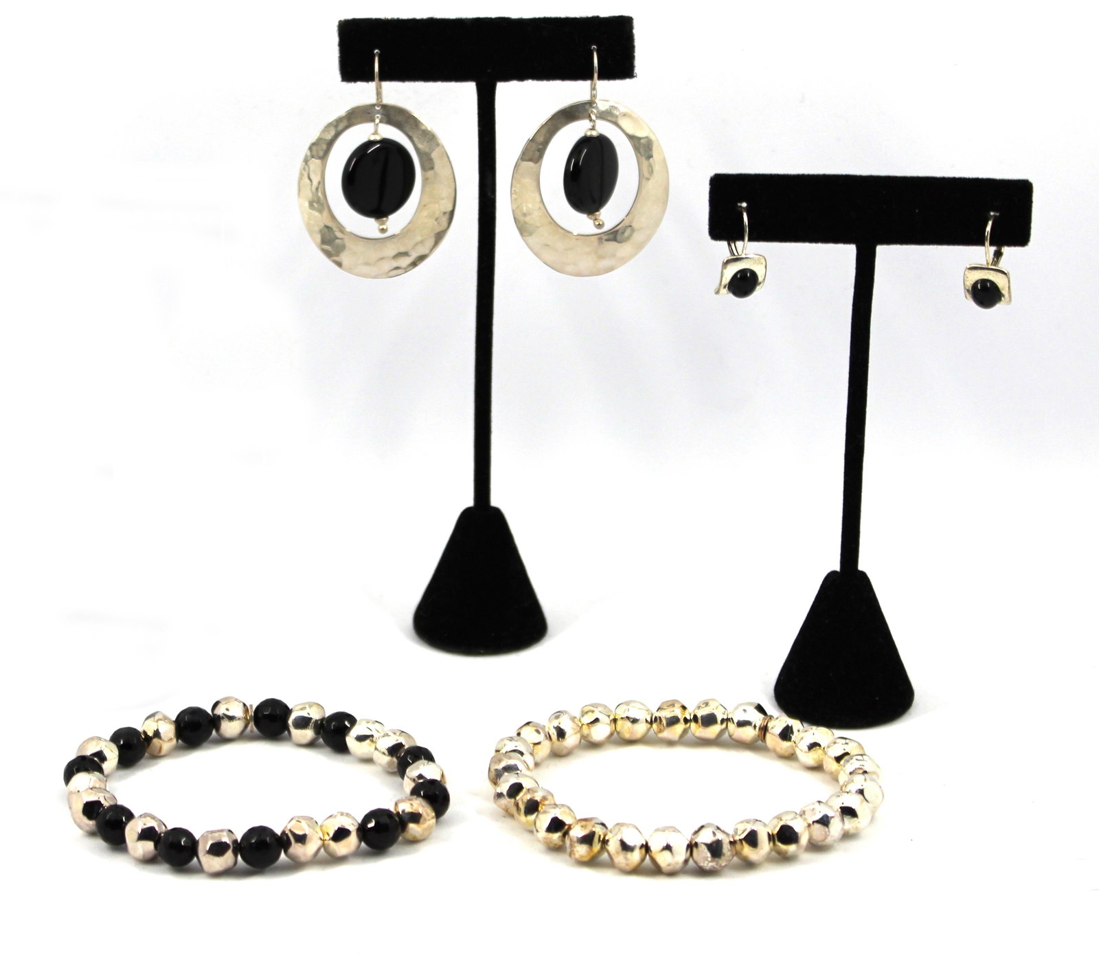 Earrings & Bracelets, Incl. Onyx & Silver, 4: Earrings & Bracelets, Incl. Onyx & Silver, 4 Earrings and bracelets, including two pairs of silver and onyx earrings, and two silver and onyx beaded elastic bracelets. Bracelet: 7" inner circumference
