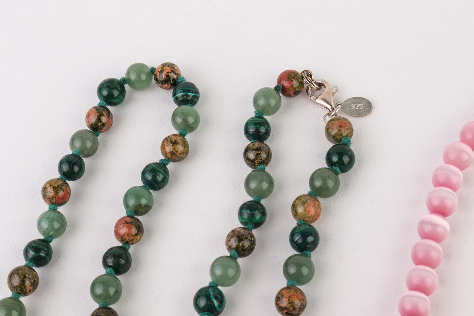 Beaded Necklace Assortment, 5 Pcs.: Beaded Necklace Assortment, 5 Pcs. Beaded necklace assortment, group of five, including one with mother of pearl, one with tiger eye and turquoise, and one with malachite, jade and jasper, and two oth