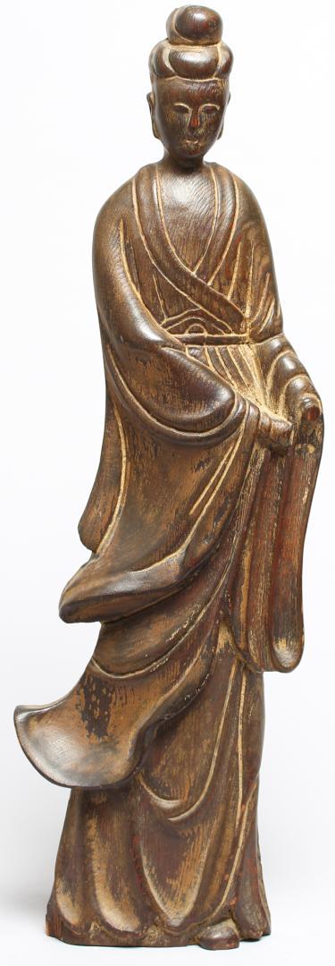 Vintage Carved Wood Wall Sculpture of Guanyin: Vintage Carved Wood Wall Sculpture of Guanyin Patinated, the goddess carved with billowing draperies and topknot. 22.5" H. Reverse with two holes drilled in head and neck for hanging.