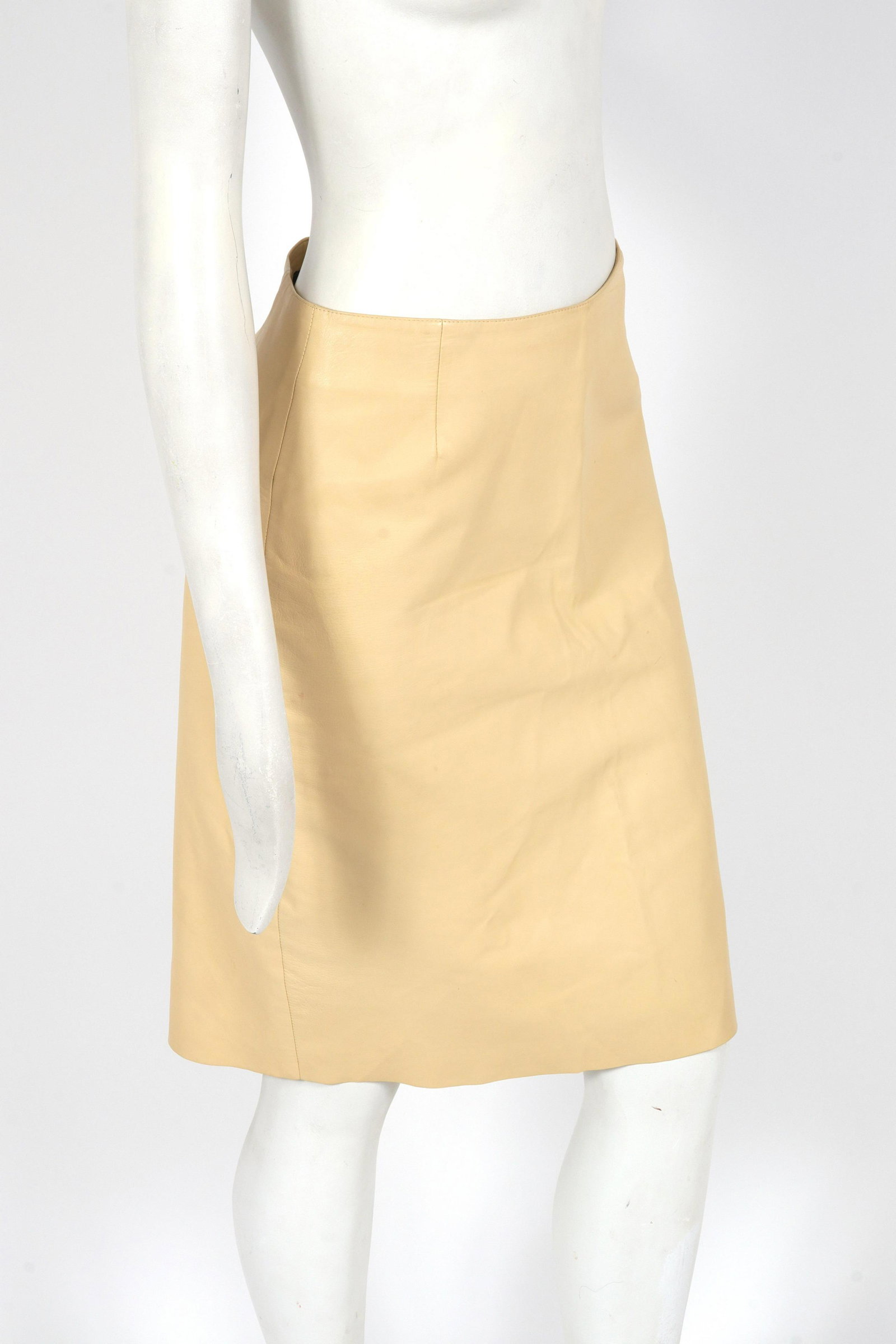 Prada Designer Leather Pencil Skirt: Prada Designer Leather Pencil Skirt Prada leather pencil skirt with back zipper, designer label "Prada Made in Italy" along with size "42" to interior. Waist: 14" W; hips: 17.5" W; length to bottom he