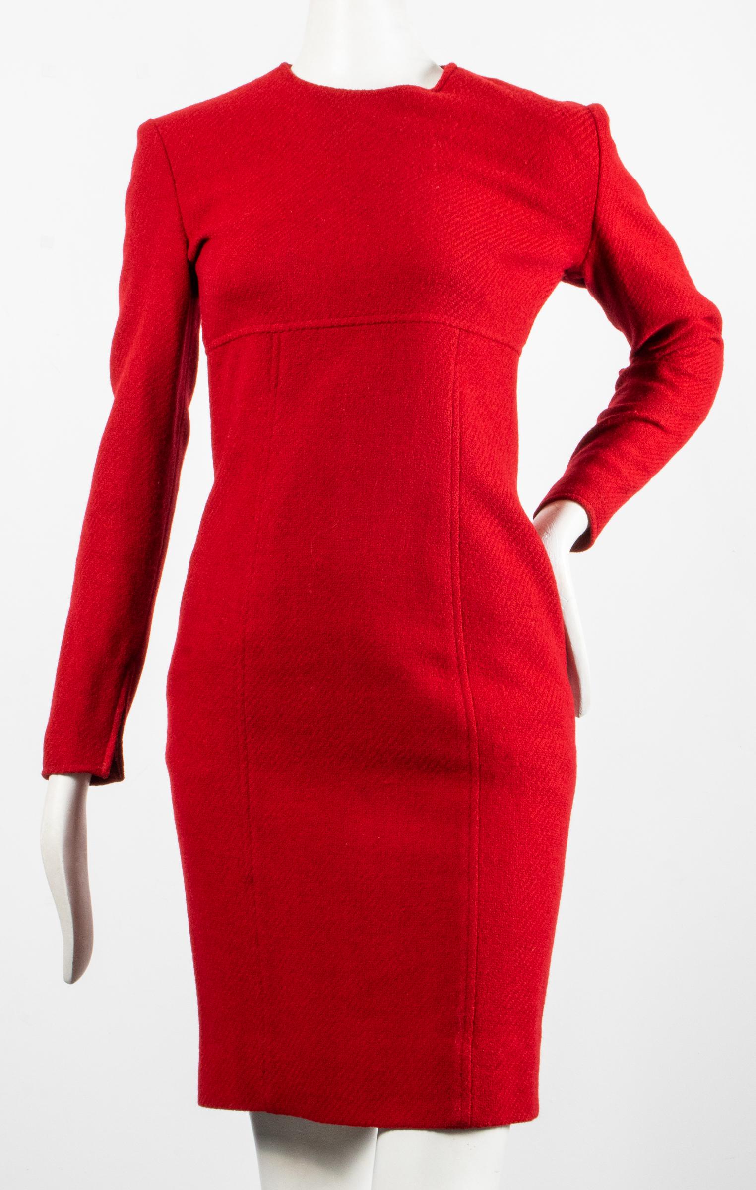 Calvin Klein Long-Sleeved Wool Blend Dress: Calvin Klein Long-Sleeved Wool Blend Dress Calvin Klein long-sleeved wool blend dress, zippered back, zippered cuffs, silk lining, designer's label and size "Calvin Klein / 8" to interior. Shoulders: 