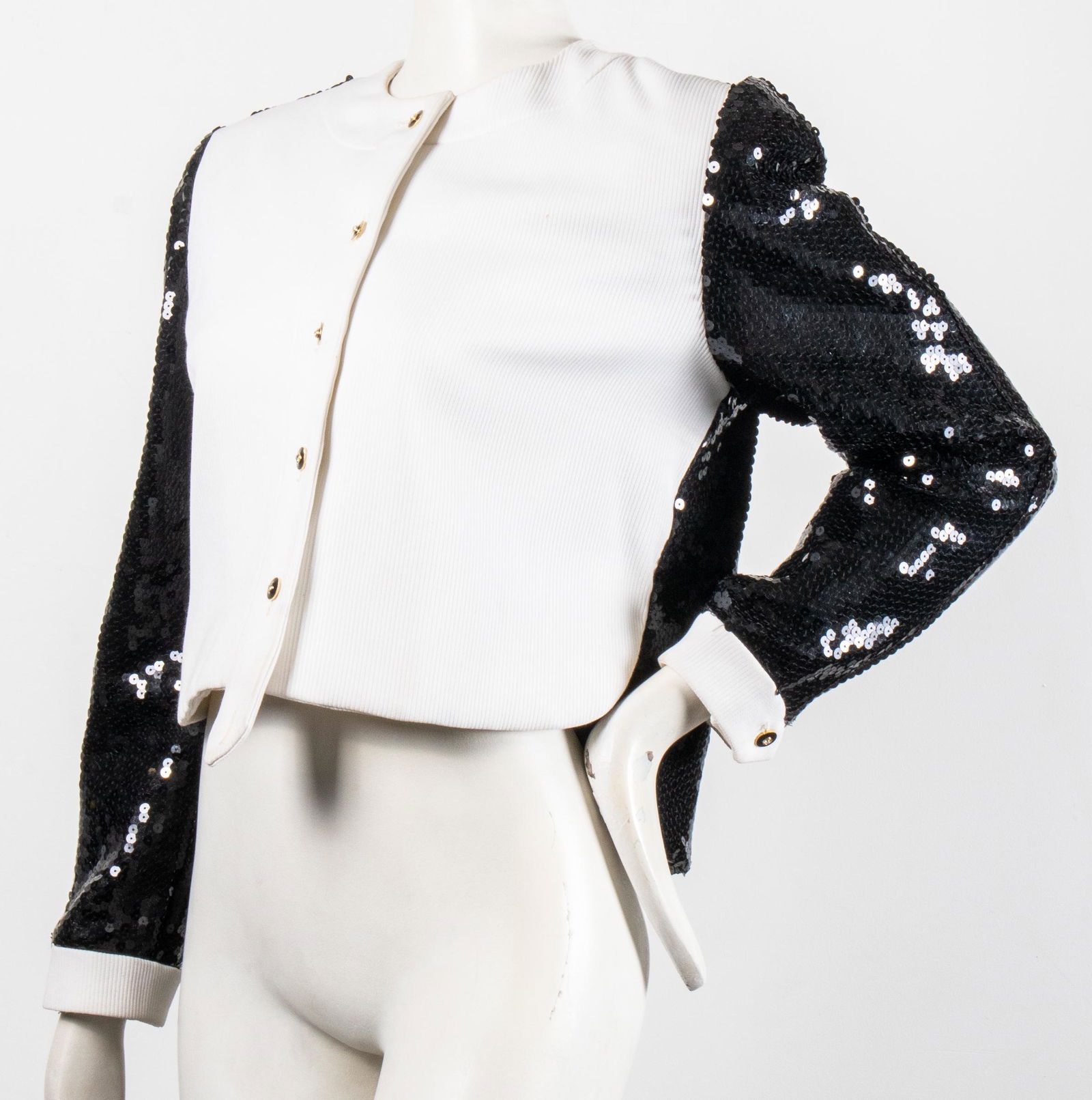 Bill Blass Black & White Jacket W Sequins: Bill Blass Black & White Jacket W Sequins Bill Blass black and white jacket / blazer, single-breasted with enamel and rhinestone buttons, padded shoulders, cropped front with ribbed white fabric, the