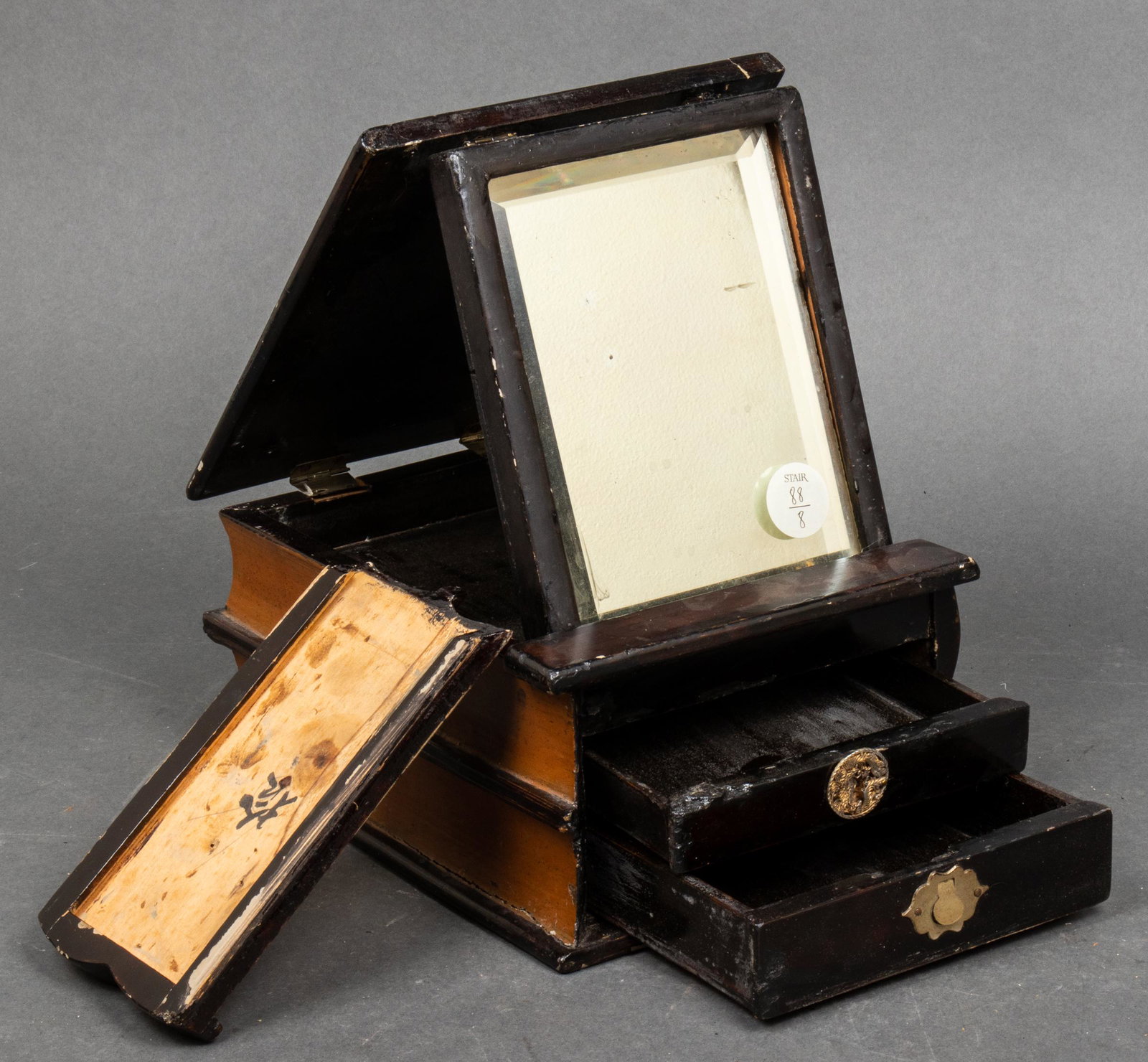 Signed Chinoiserie Lacquered Book Form Dresser Box: Signed Chinoiserie Lacquered Book Form Dresser Box Antique Chinois lacquered book form box featuring a mirror and a sliding panel revealing two drawers with distinct hardware, signed to panel interior