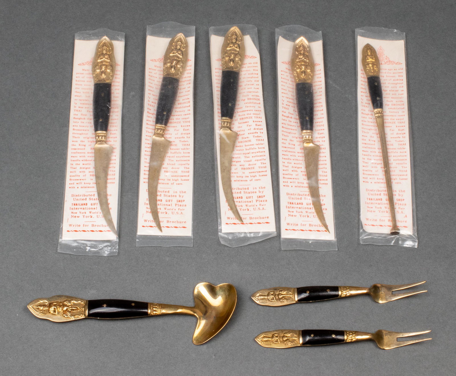 NY World's Fair Thai Bronze & Bone Utensils, 8: NY World's Fair Thai Bronze & Bone Utensils, 8 Group of eight pieces of Thai bronze and bone souvenir utensils from the Thailand gift shop at the New York World's Fair, including five pieces in origin