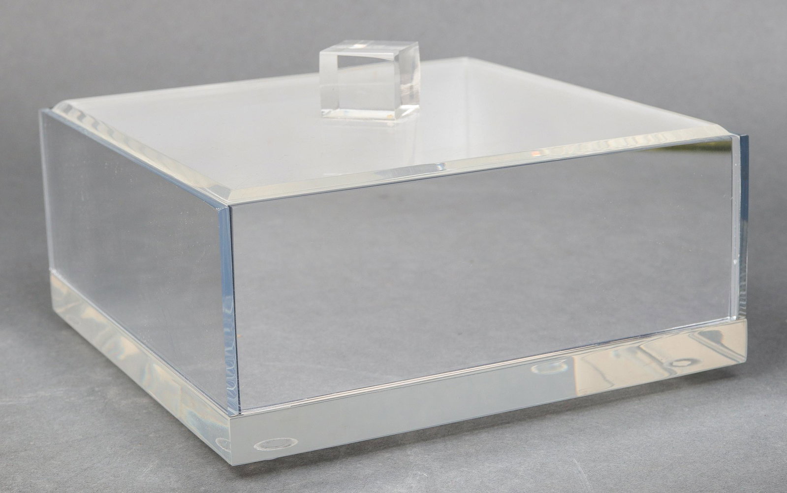 Modern Lucite Tableware Incl. Tray, 3 Pcs.: Modern Lucite Tableware Incl. Tray, 3 Pcs. Modern Lucite tableware accessories including one tray with lifted corners, one lidded box with compartments, and one lidded box with mirrored exterior. Tray