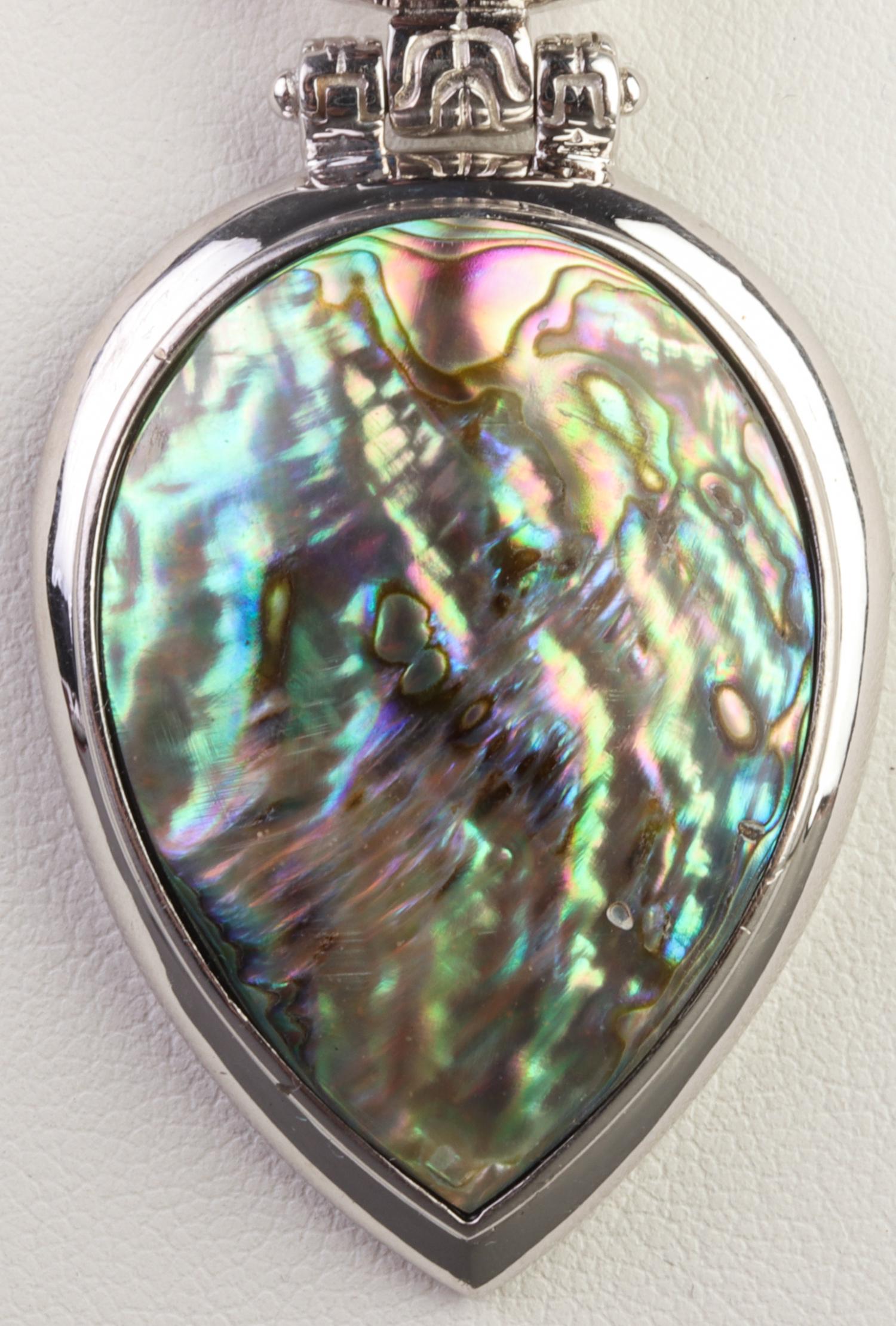 Sterling Silver Abalone Teardrop Pendant Necklace: Sterling Silver Abalone Teardrop Pendant Necklace Modern sterling silver inverted teardrop abalone slide pendant on a popcorn chain necklace with lobster claw clasp, marked on both "925." Abalone appr