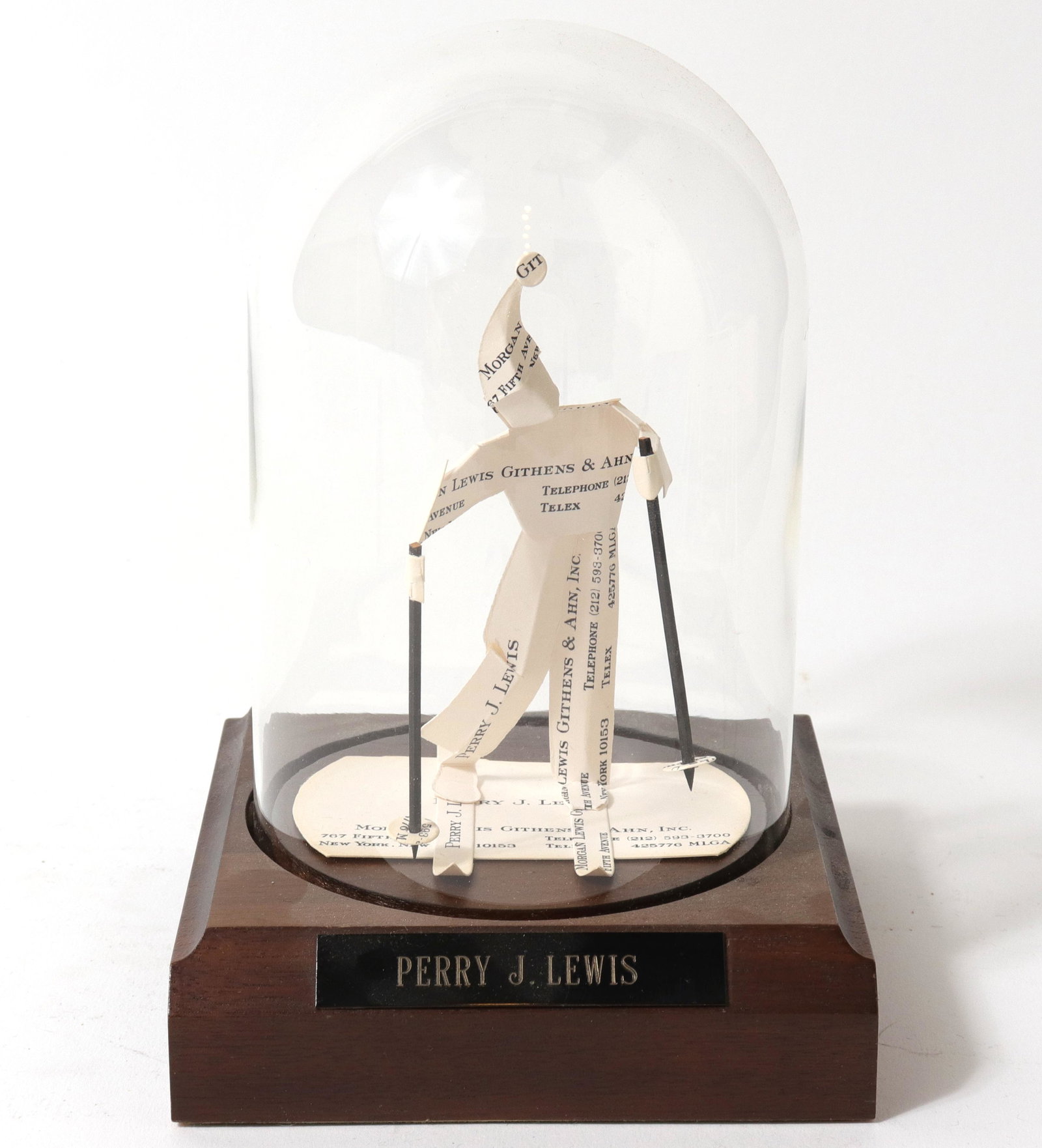 Perry J. Lewis "Skier" Business Card Sculpture: Perry J. Lewis "Skier" Business Card Sculpture Perry J. Lewis modern business card paper sculpture depicting a cross country skier, housed under glass dome and mounted to wooden base, plaque inscribed