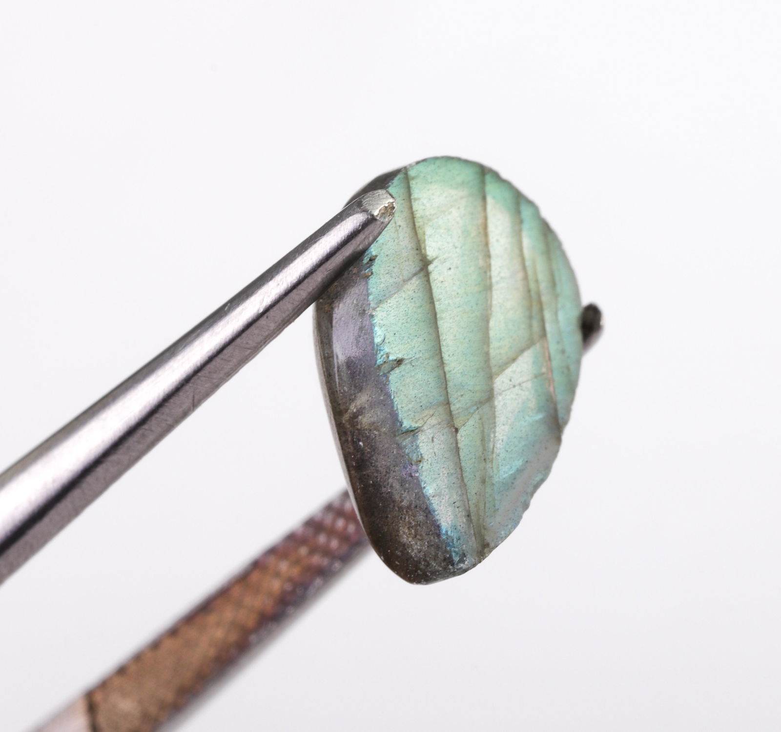 31.7 cttw. Loose Mixed-Cut Labradorite Gemstones: 31.7 cttw. Loose Mixed-Cut Labradorite Gemstones 31.7 cttw. collection of loose mixed-cut labradorite gemstones. Stones range in size from 15 mm. to 10 mm.