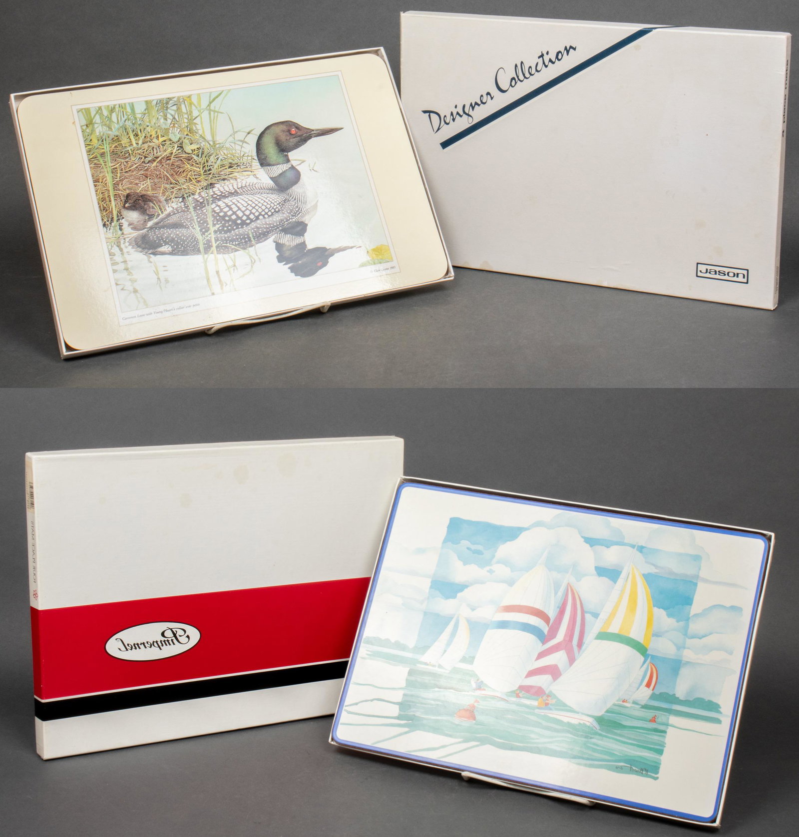 Regatta & Aviary Themed Place Mats, 2 Sets: Regatta & Aviary Themed Place Mats, 2 Sets Two sets of four cork pictorial place mats, comprising Pimpernel English "Regatta" mats and Jason Designer Collection "Common Loon" by Glen Loates, in origin