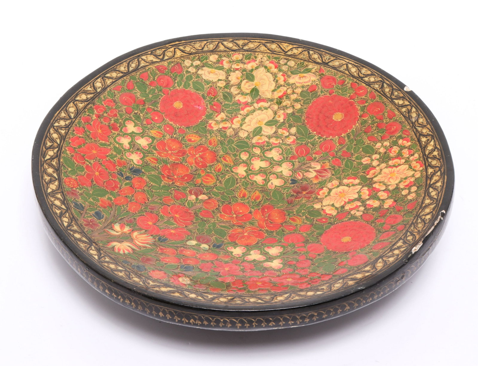 Indian Paint Decorated Plate: Indian Paint Decorated Plate Indian paint decorated plate, 20th century, with label “HAND MADE BY M. Sadak Ali & Bros.” 2” H x 10.25” diameter. Chips.