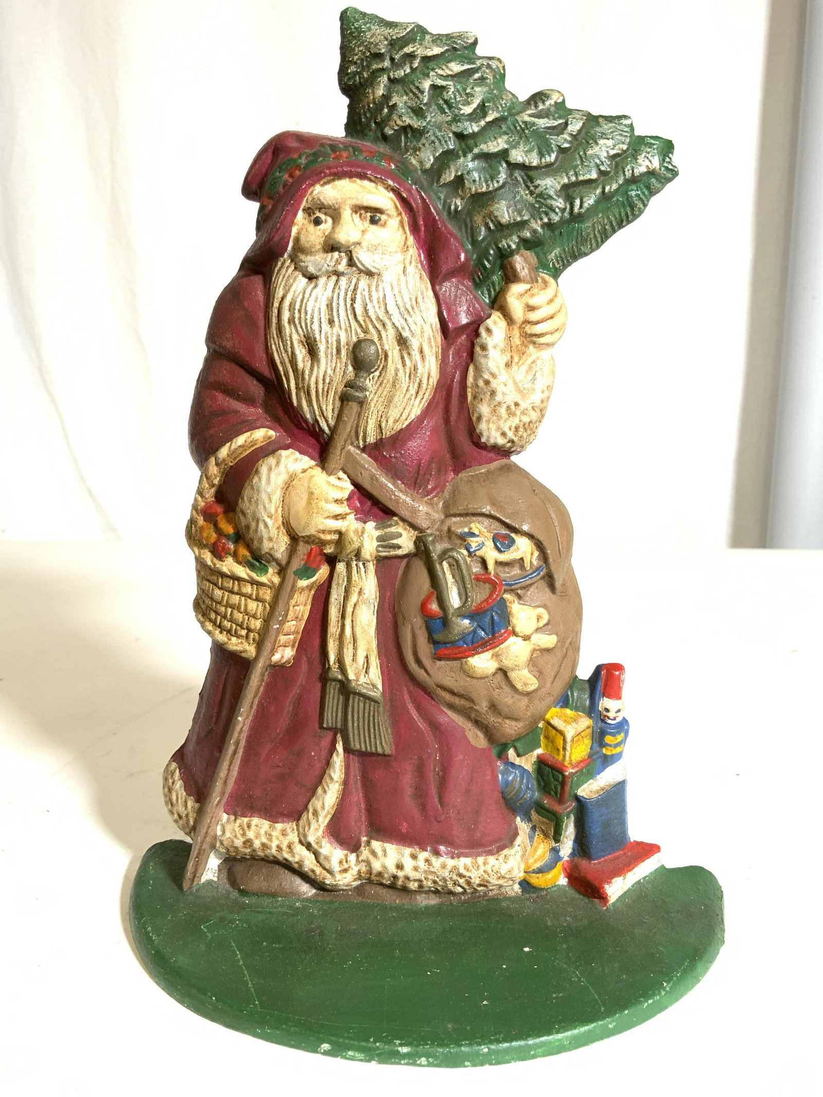 MIDWEST IMPORTERS Hand Painted Iron Door Stop: Backside of piece has tag which reads MIDWEST IMPORTERS OF CANON FALLS INC. Piece depicts and elderly bearded male figure. Piece measures approx 10 inches tall 7 inches wide 4 inches deep. Door stop, 