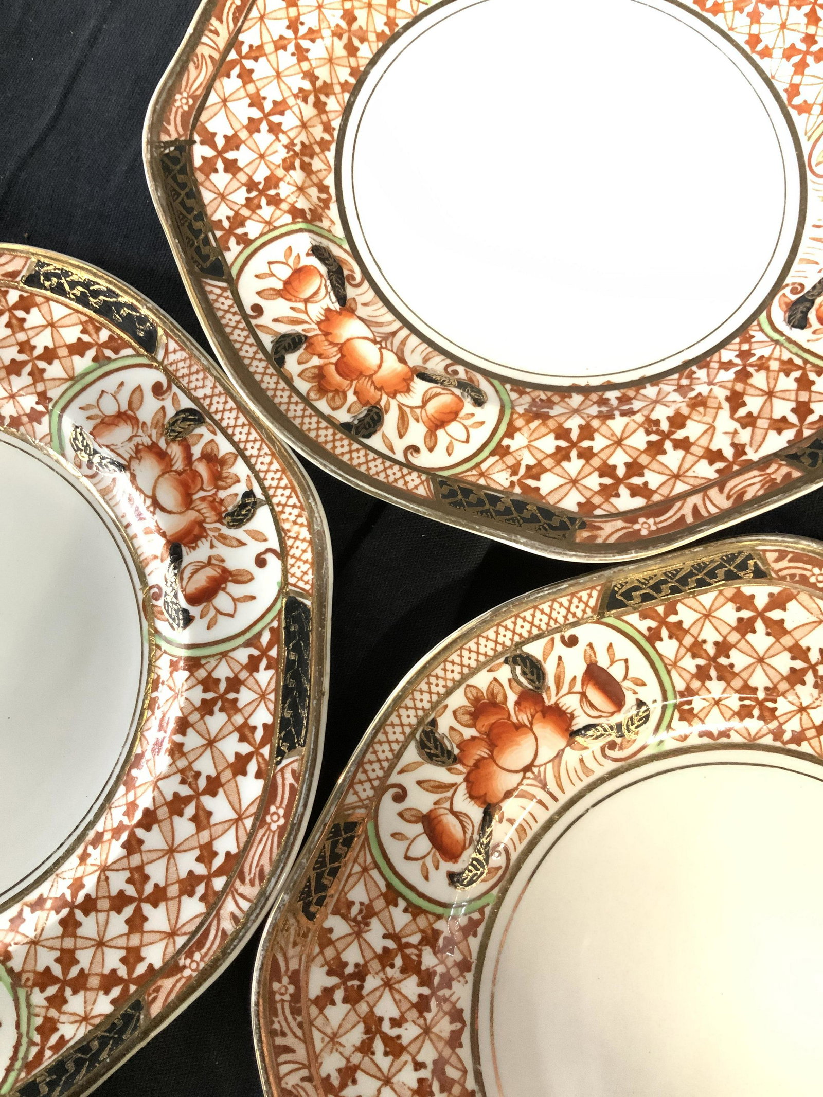 Set 9 J. Kent Ltd. Hand Panted Porcelain Plates,: Vintage Hallmarked plates with stamp under glaze, reads Made in G. Britain- J. Kent Ltd. Asian Amari style dessert plates, hand painted with flower cartouches, reticulated patterns in orange and hint 