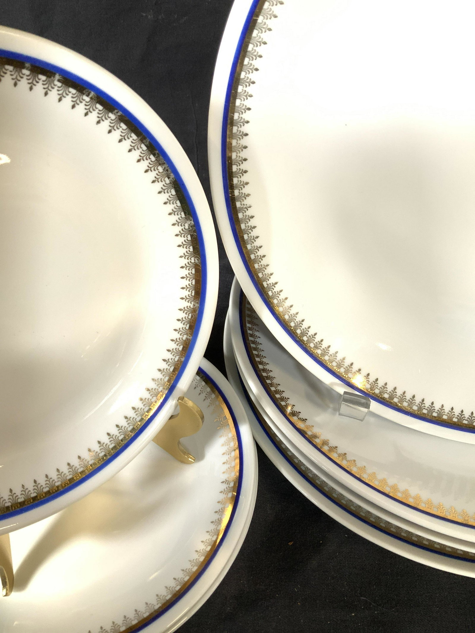 Set 17 MZ & HC White Porcelain Dinnerware,: Czechoslovakia. Coordinating white porcelain with beautiful rim fleur de lis gilt pattern. Vintage, Hallmarked made in Czechoslovakia. Set of 4 MZ dinner plates (10.5 in.) with 5 smaller plates also m
