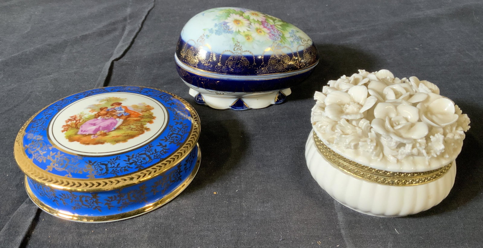 Lot 3 Vintage Trinket Boxes, LIMOGES & More: Lot 3 Vintage Trinket Boxes, LIMOGES & More, inscription to circular trinket box reads ‘Limoges DC France’, measures 1 3/8 inches tall x 4 7/8 inches in diameter, inscription to egg shaped box rea