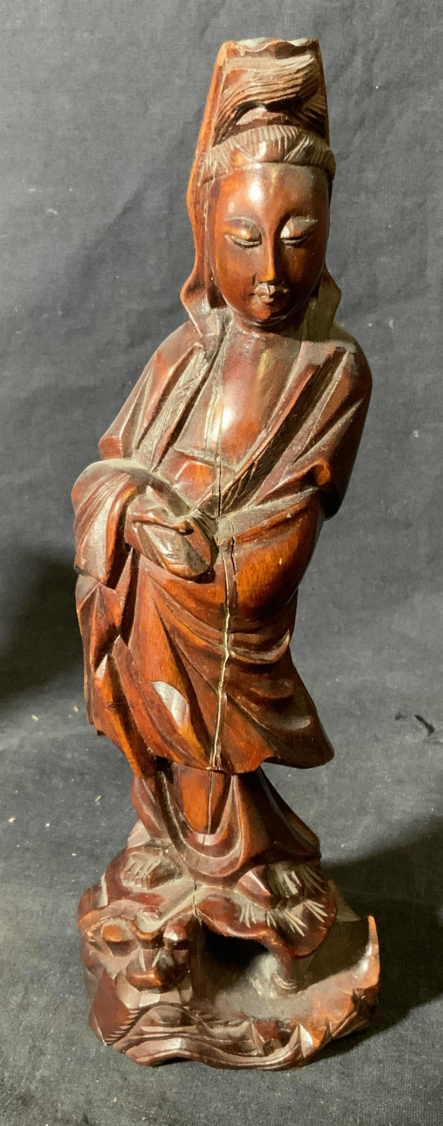Group lot 3 Asian Wooden Figurines: Group lot 3 Asian wooden figurines, no apparent inscriptions or markings to any of the pieces, lot consists of two wooden statues and a wooden mask, each have a different toned stain to the wood, larg