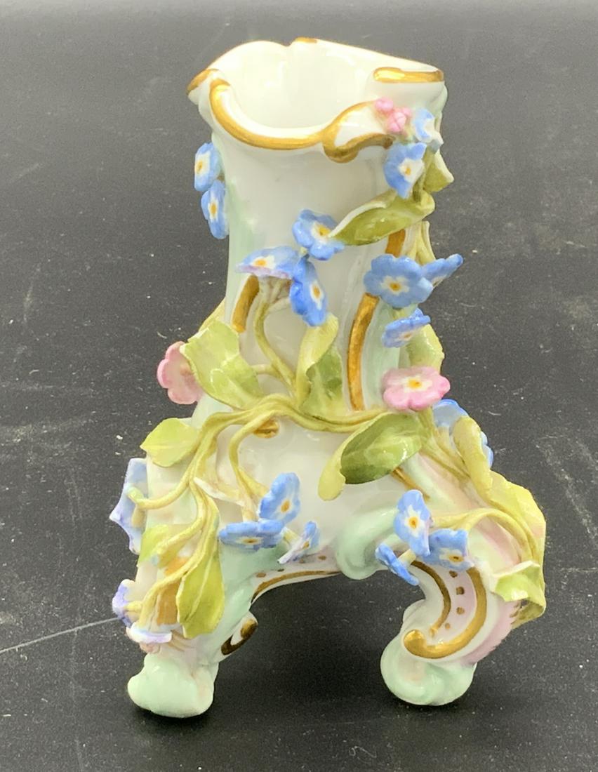 Meissen Porcelain Floral Candlestick Holder: Meissen Porcelain Floral Candlestick holder, Meissen blue stamp to underside, surface of piece covered in floral designs or blue and pink, some gilding to piece, measures approximately 4 inches tall, 