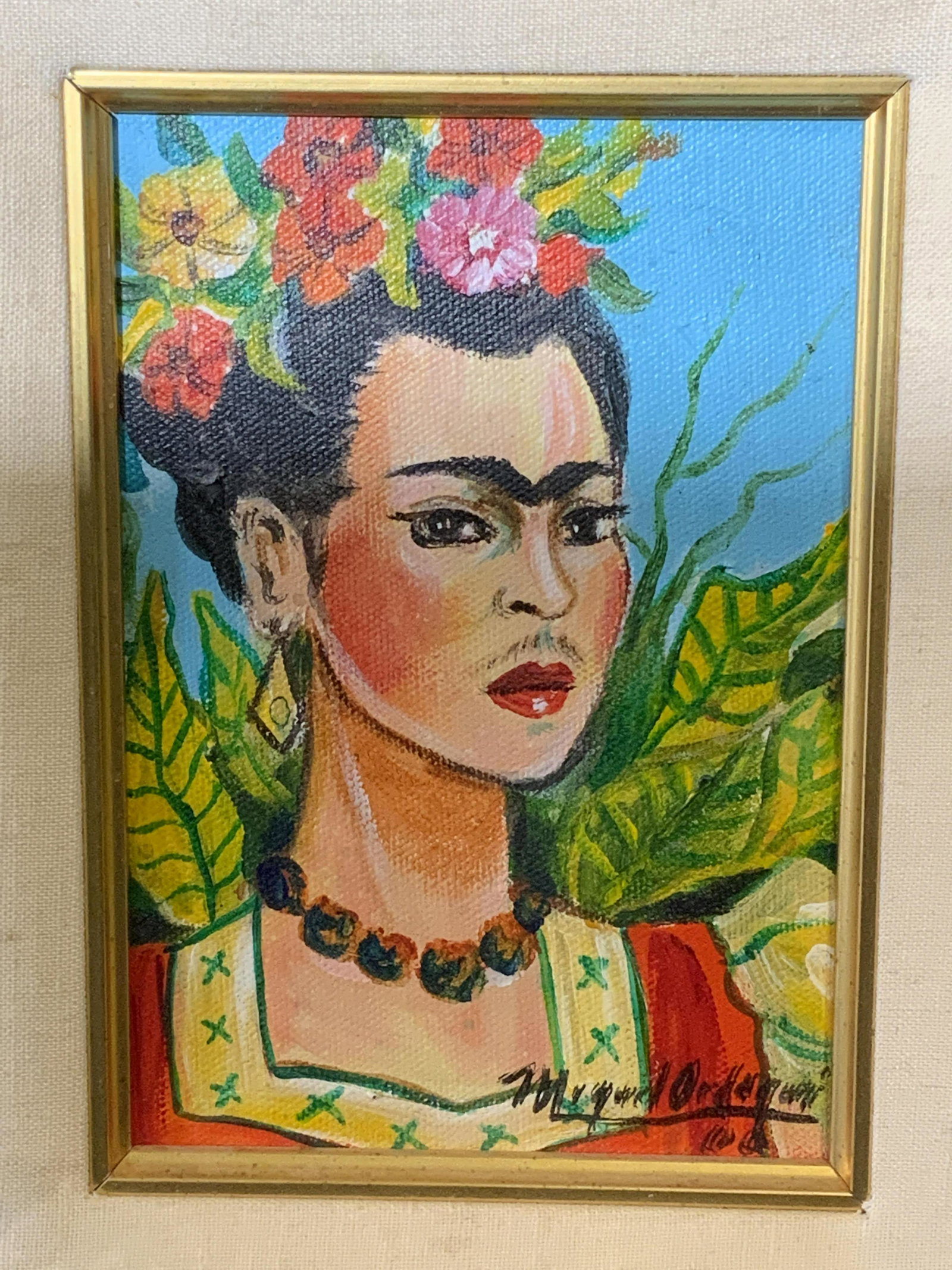 MIGUEL ORDOQUI Signed Oil on Canvas Frida Kahlo: Miguel Ordoqui signed oil on canvas portrait of Frida Kahlo, signature to the lower right corner reads ‘Miguel Ordoqui’, date to lower right corner possibly reads ‘66’, text to reverse in penc
