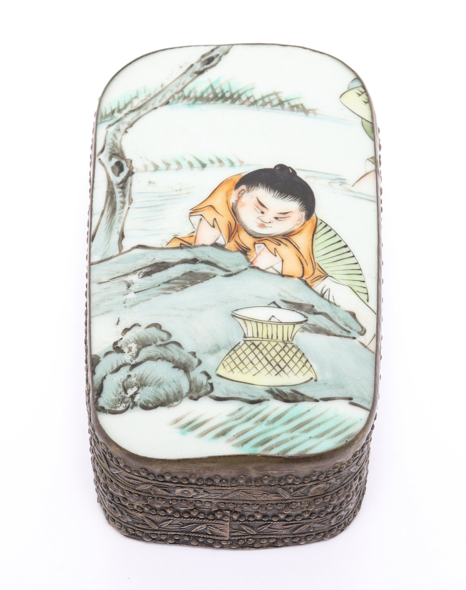 Asian Porcelain Covered Box: Asian covered box, early 20th century, the silver-tone box with floral and foliate decoration, the lid inset with paint decorated porcelain plaque depicting a man foraging. 1.5" H x 2.5" W x 4.75" D.