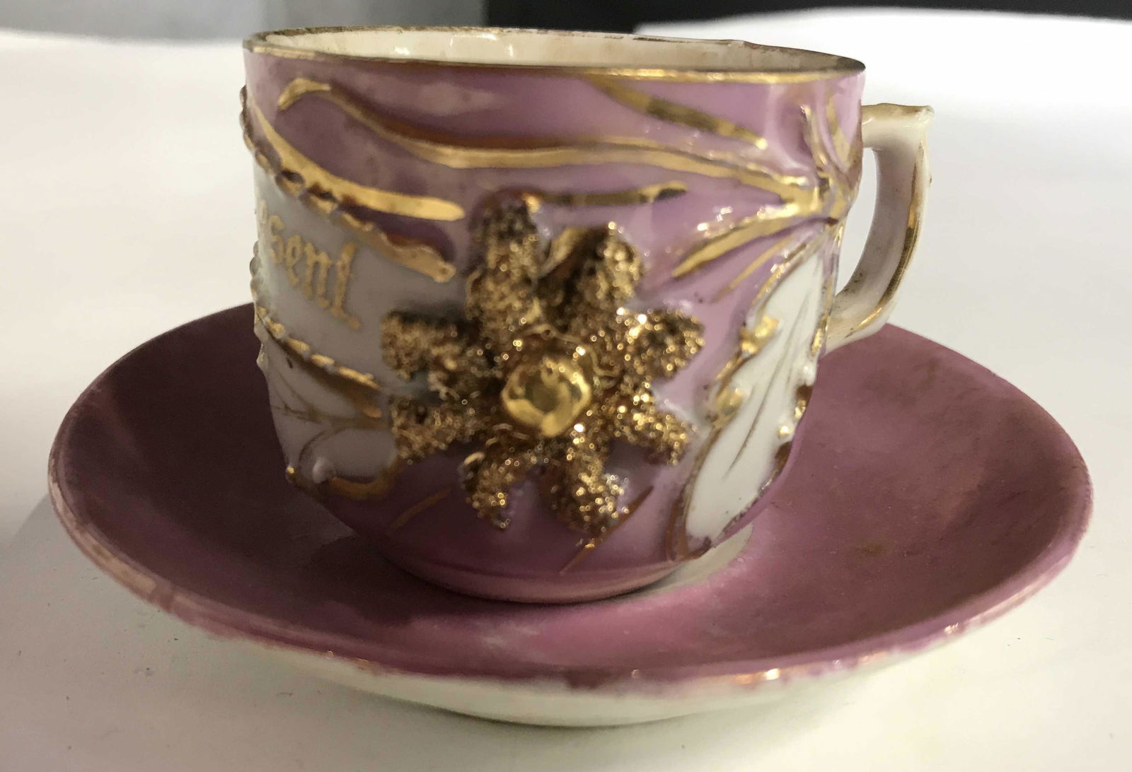 Antique German Porcelain Cup Saucer: Pink and gold paste up porcelain, trademarks underside, saucer measures diameter 4.5 inches. individual tea service, tableware, collectible.