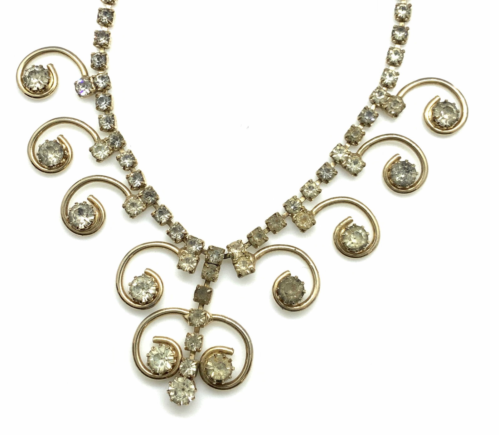 SARAH COV Rhinestone Art Nouveau Choker Necklace: Vintage Bib style choker with several swirl drop pendants and solitaire rhinestones prong set. Main pendant has double swirl. Necklace hooks near drop neck rhinestone Approx. Length 16 - 14 in. Signed