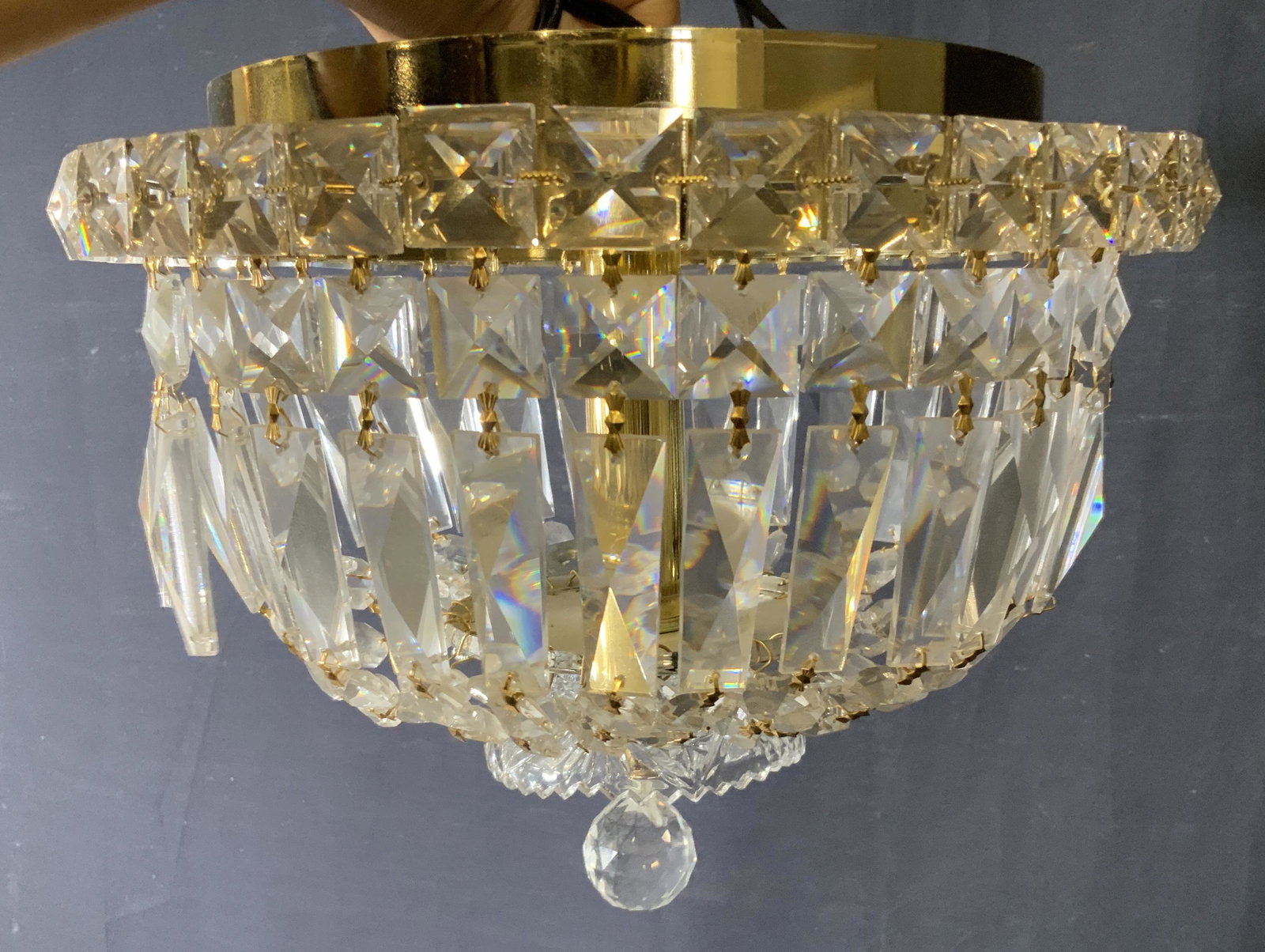 Glass Ceiling Chandelier W Hanging prisms: Glass ceiling chandelier, piece made of many cut glass pieces creating a bubble shape, gold metal accents to piece, some prisms to the bottom appear to be missing, needs to be electrified, measures ap