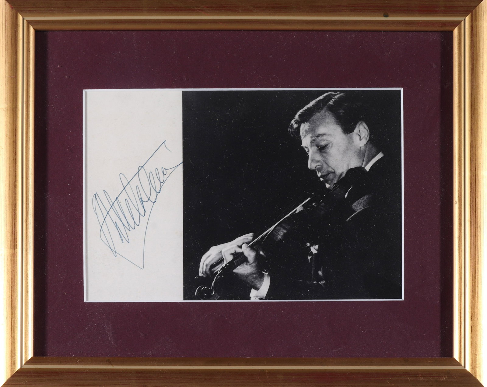 Nathan Milstein Framed Autograph And Image: Framed autograph and image of violinist Nathan Milstein, 20th century, within a later gilt frame. 9.5” H x 11.5” W.