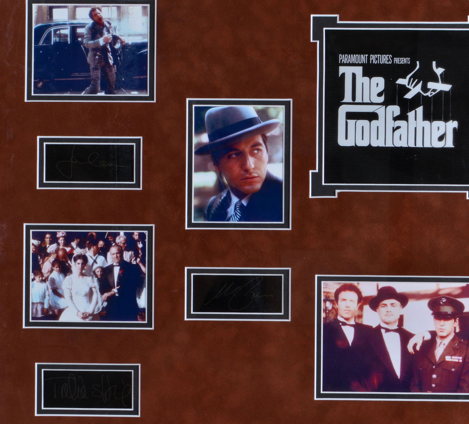 The Godfather Photograph Collage w Autographs: The Godfather photograph collage featuring stills from the film, interspersed with cast autographs including Marlon Brando, Diane Keaton, Talia Shire, and others. Image: 19.75" H x 31.5" W; frame: 22"