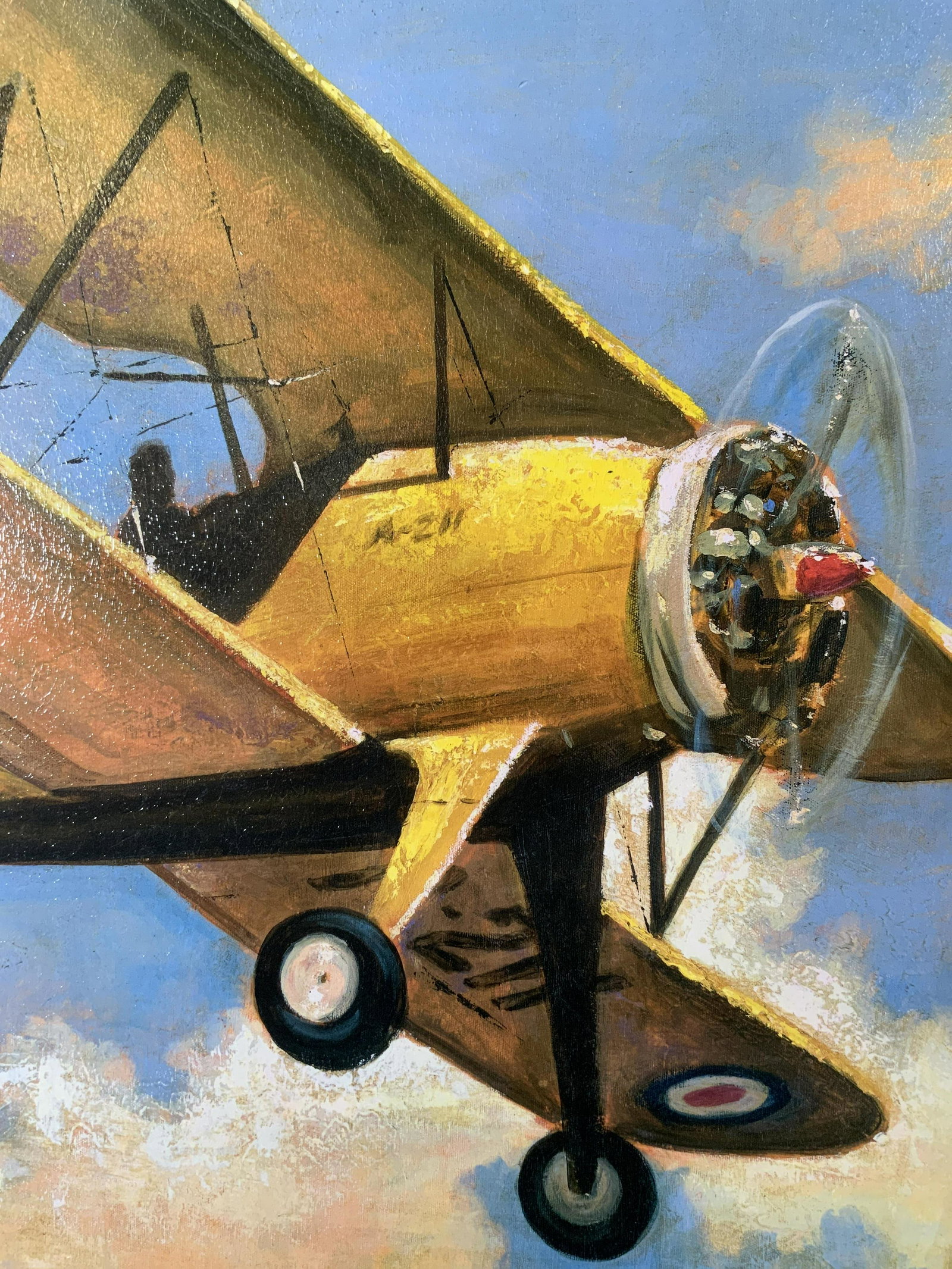 Digital Print of Biplane, Artwork: Digital Print of Biplane, inscription to lower right illegible, subject a yellow plane, measures 24 3/4 x 24 3/4 inches, black composite frame, some surface wear to frame, professionally framed, not e