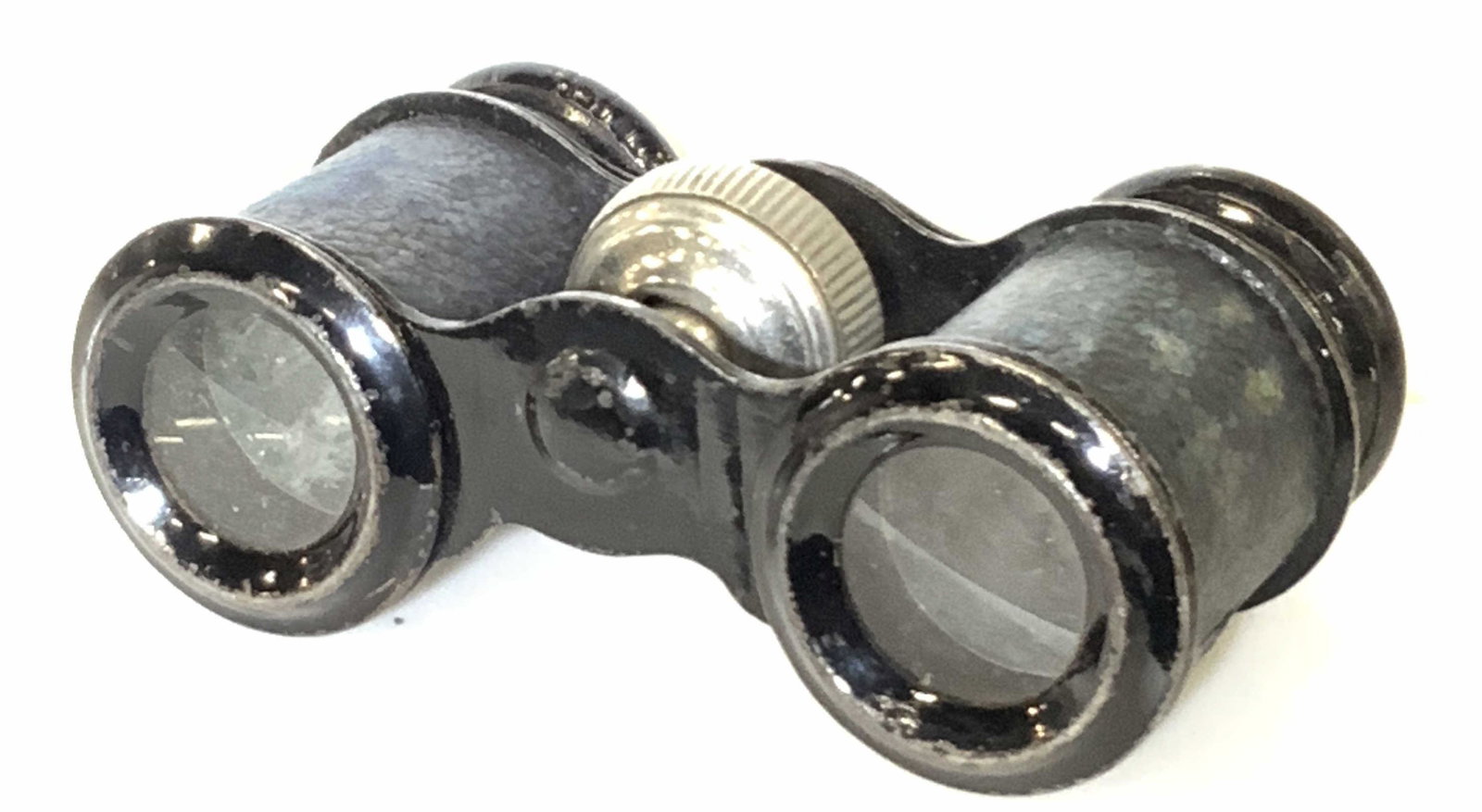 Vintage Collectible Blue Leather Style Binoculars: Vintage binoculars crafted from metal and leather style materials. Primarily black with blue hued accents. The metal hardware in the center of the piece is used to loosen or tighten. Approx. 2L x 3.5W