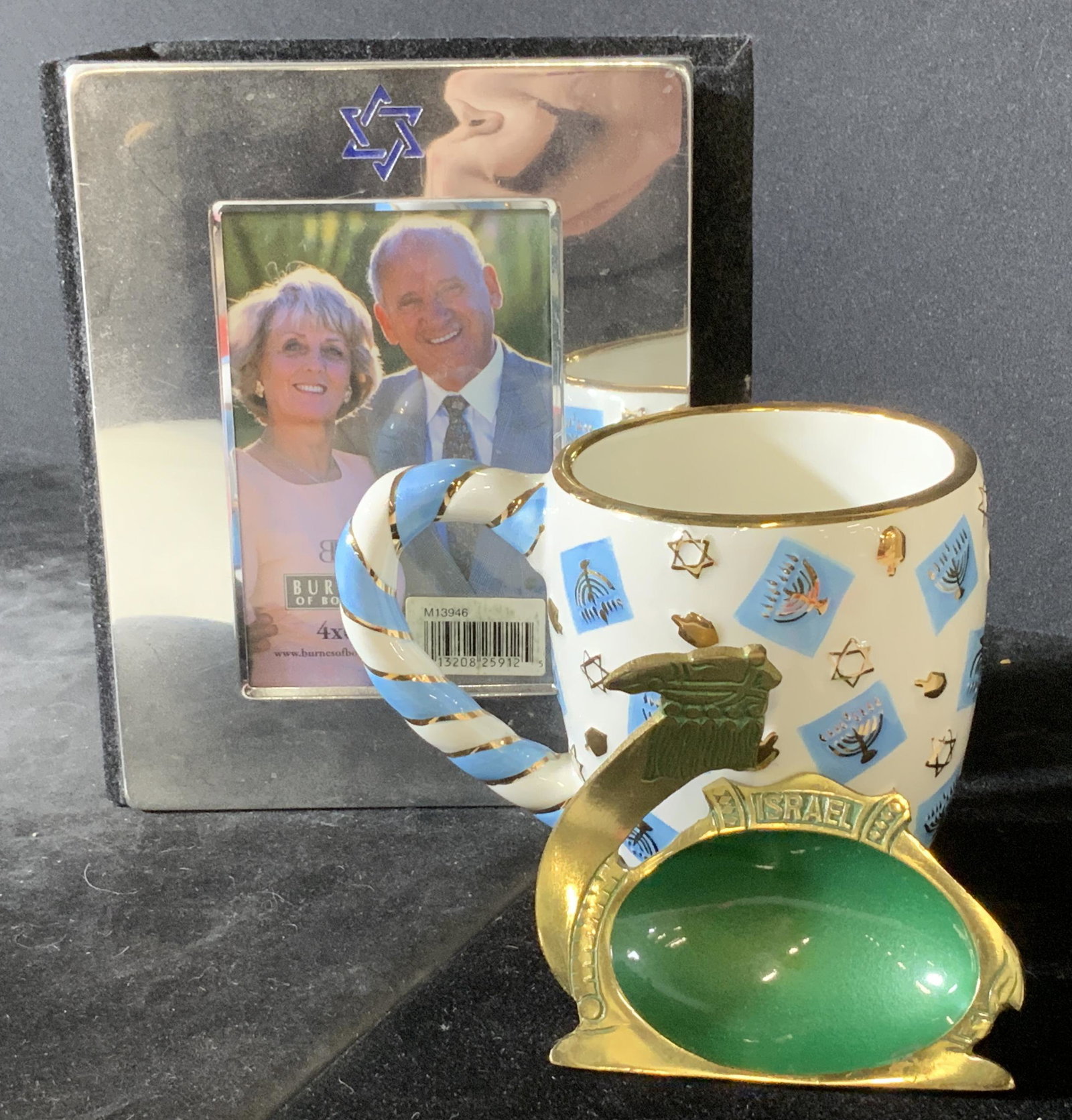 Lot 3 Israeli Decorative Desktop Items: Brass Camel & enamel Trinket Dish labeled Israel, for paper clips or other stationary items. Porcelain blue and white gilt coffee mug with Dreidel, Star of David & menorah decor, 4 in ht, 3 n. Diamete