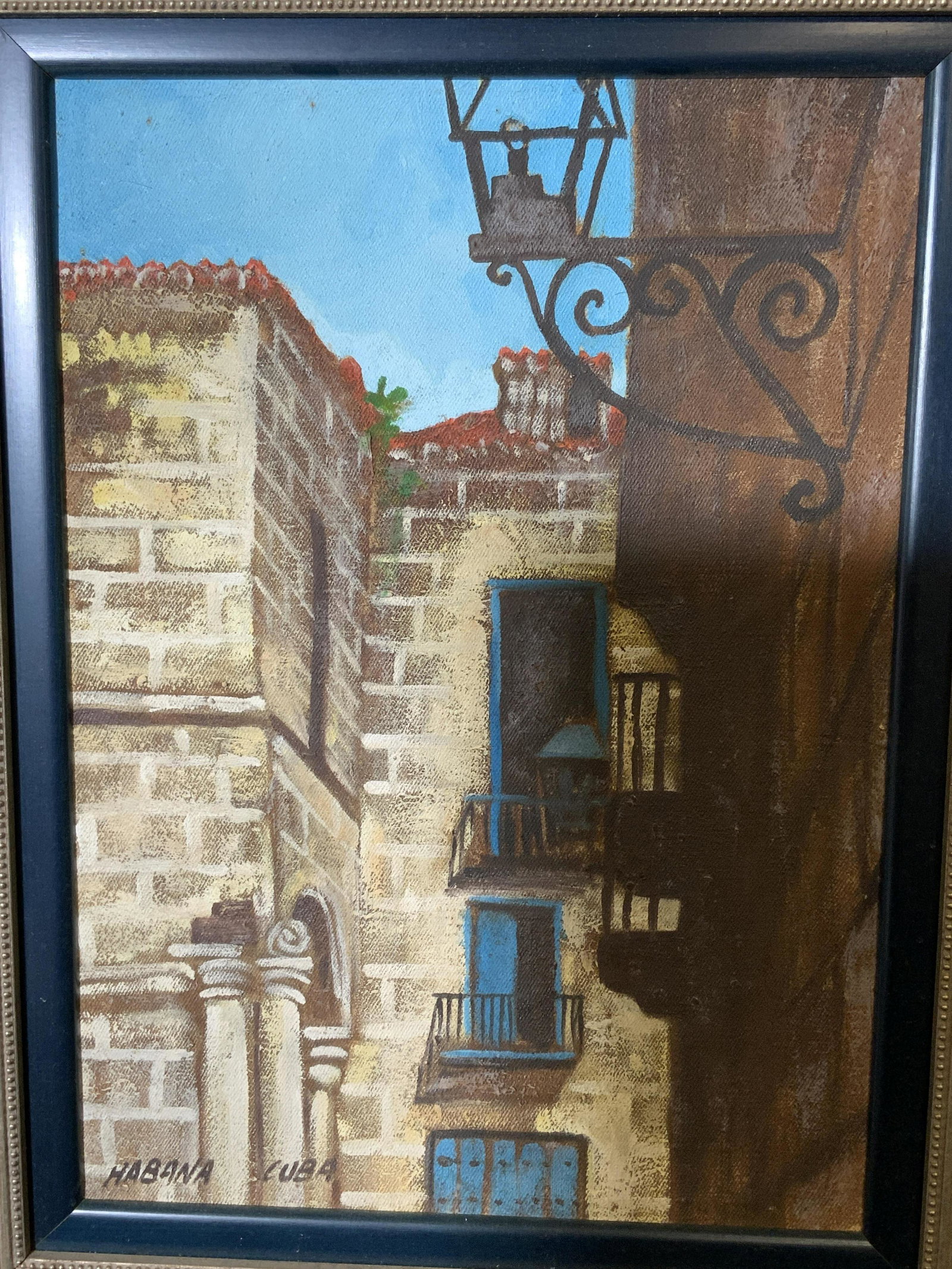 Oil On Canvas Havana Cuba, Artwork: Oil on canvas Havana Cuba, text to the lower left corner reads ‘Havana, Cuba’, text to verso in Spanish, subject the side of a building in Havana with white brick and blue windows, inner frame blu