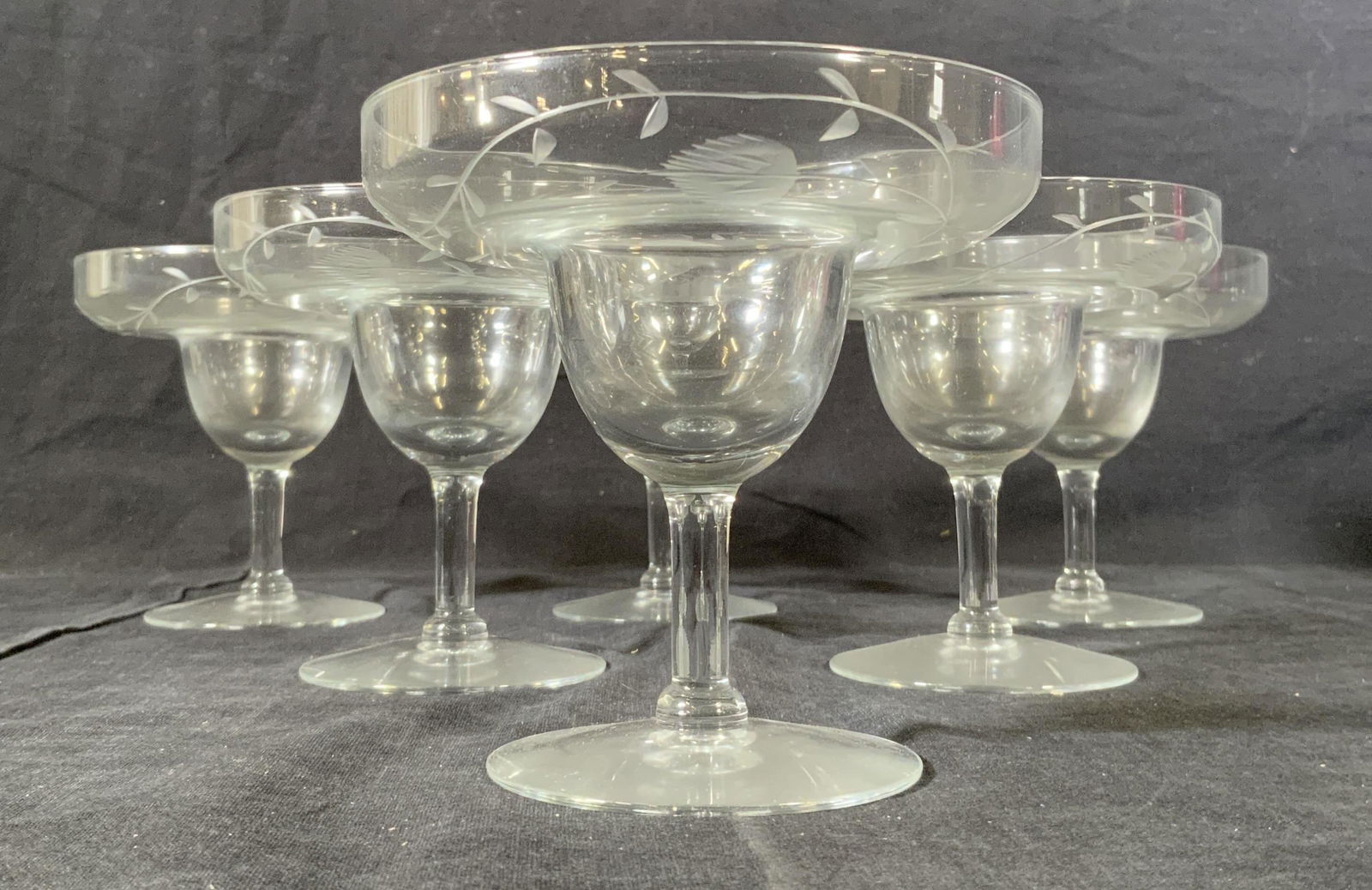 Set 6 Etched Margarita Glasses: Set 6 Etched Margarita Glasses, no apparent inscriptions or marks, etched with stylized vegetal elements, all measure 4 3/4 inches tall x 4 7/8 inches, some surface wear to pieces, Bar ware, glassware