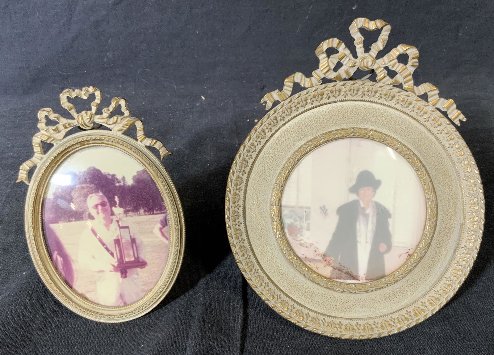 Pair Vintage Metal Decorative Picture Frames: Pair vintage metal picture frames, one is and oval shape the other is circular, Larger of the two measures 4.5 inches in diameter, not examined out of frame, some wear to both, fabric pulls to reverse