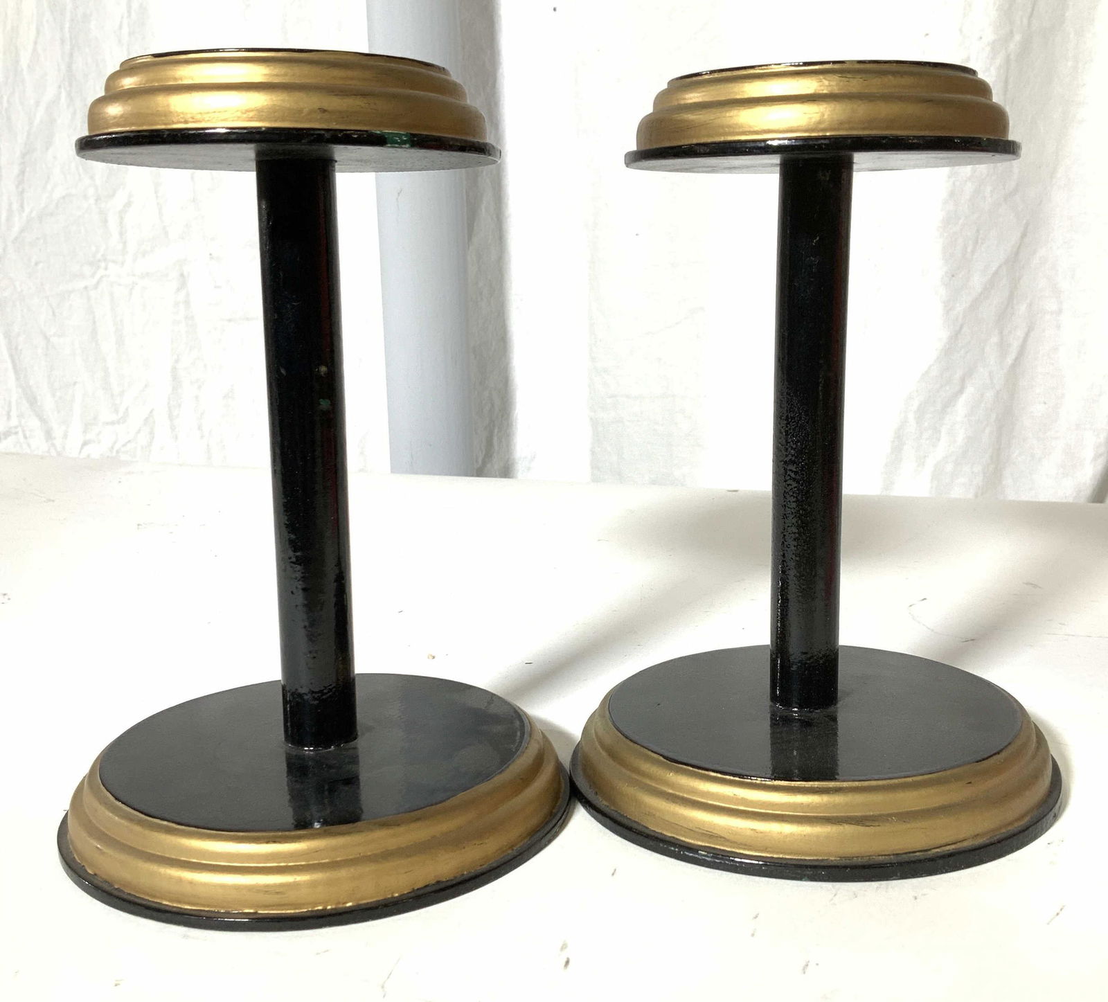 Pair Free Standing Hat/ Wig Stands: Vintage Wood Racks , painted black and gold in high gloss paint, app 7.75 in. Ht, base 5. 5 in. Wide. Property of Manhattan Estate Wig stand, hat stand, vintage hat and wig rack, freestanding wood hat