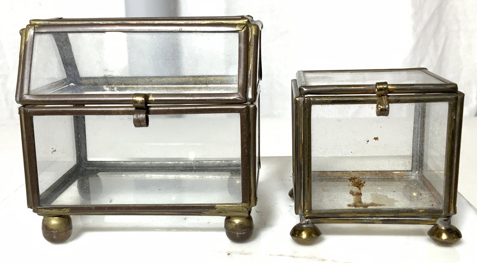Lot 2 Footed Metal and Glass Miniature Boxes: Lot 2 Metal & Glass Boxes with lids, perfect for holding a handful of shells, rocks, crafts, more. smaller box measures 2 x 2 in. larger box measures 3x 3 in. Metal and glass trinket boxes, collection