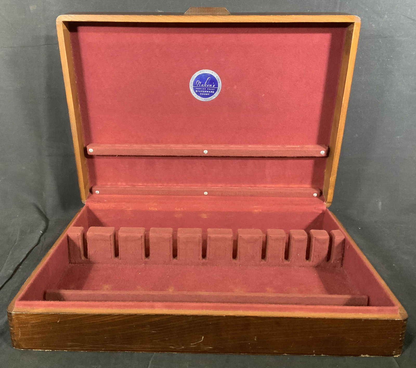Naken’s Wooden Silverware Chest: Naken’s Wooden Silverware Chest, label to interior reads ‘Naken’s tarnish proof silverware chest Made and Guaranteed by MI Naken Chicago’, fabric interior, comes with Arthur A Everts silver ke