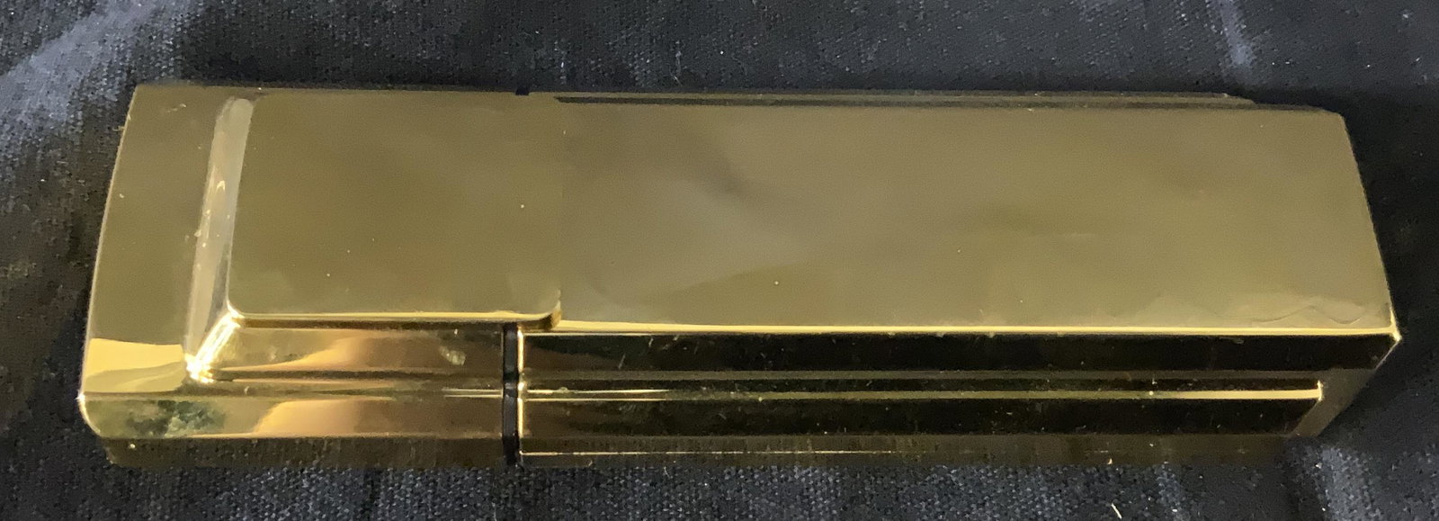 Carolina Herrera Perfume Purse Spray: Caroline Herrera Perfume Purse Spray, label to underside reads ‘Caroline Herrera Perfume purse spray, bottle appears to be made of a metallic gold toned composite material, bottle measures 4 inches 