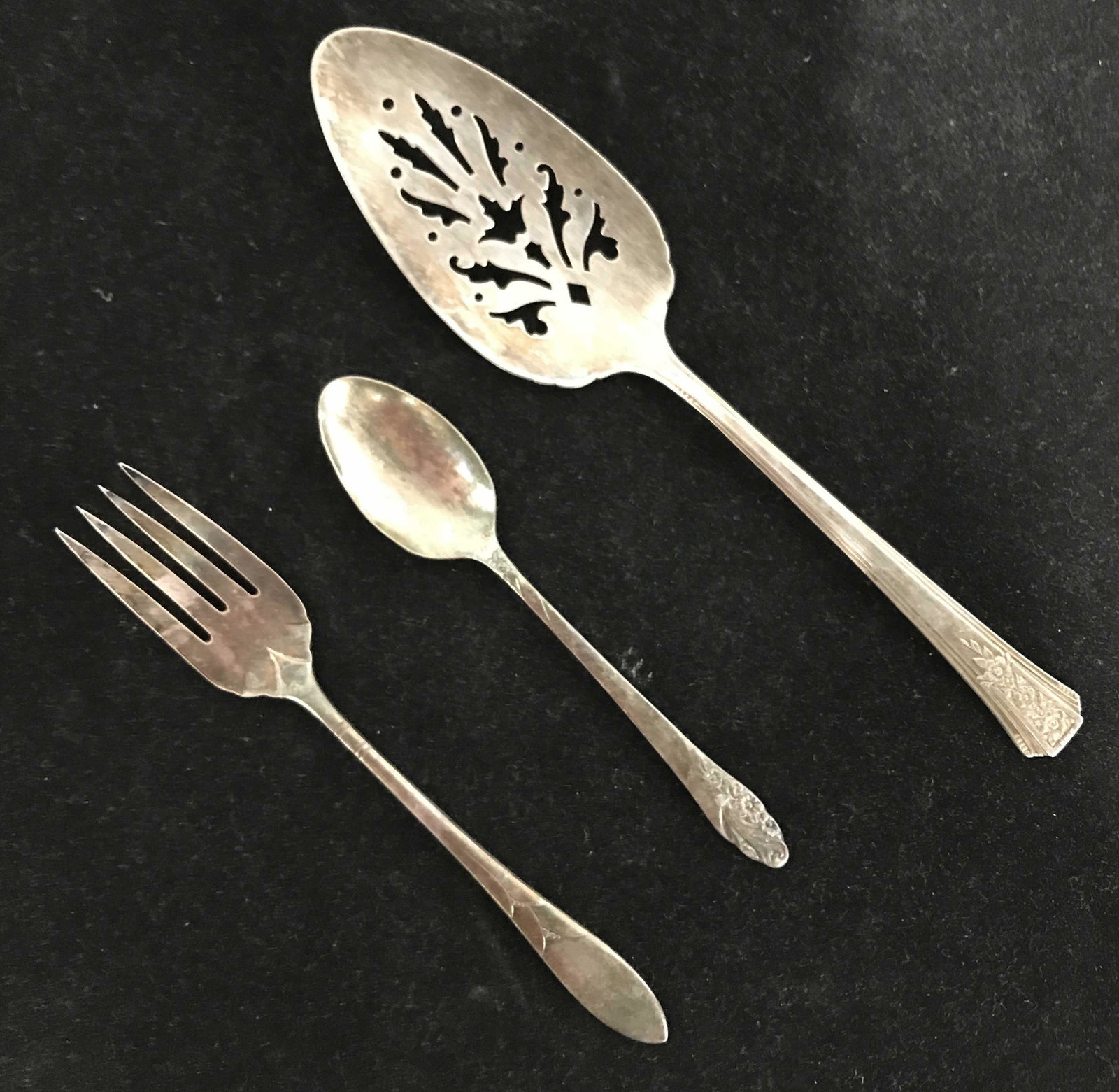 Lot 3 COMMUNITY PLATE Silver Utensils: 5/8 inch long. Simple in style with intense color impact. Green beryl doublet earrings with two .10 carat emerald cut stones. With hook style closures for pieced ears. 5/8 inch from top of hook to bot