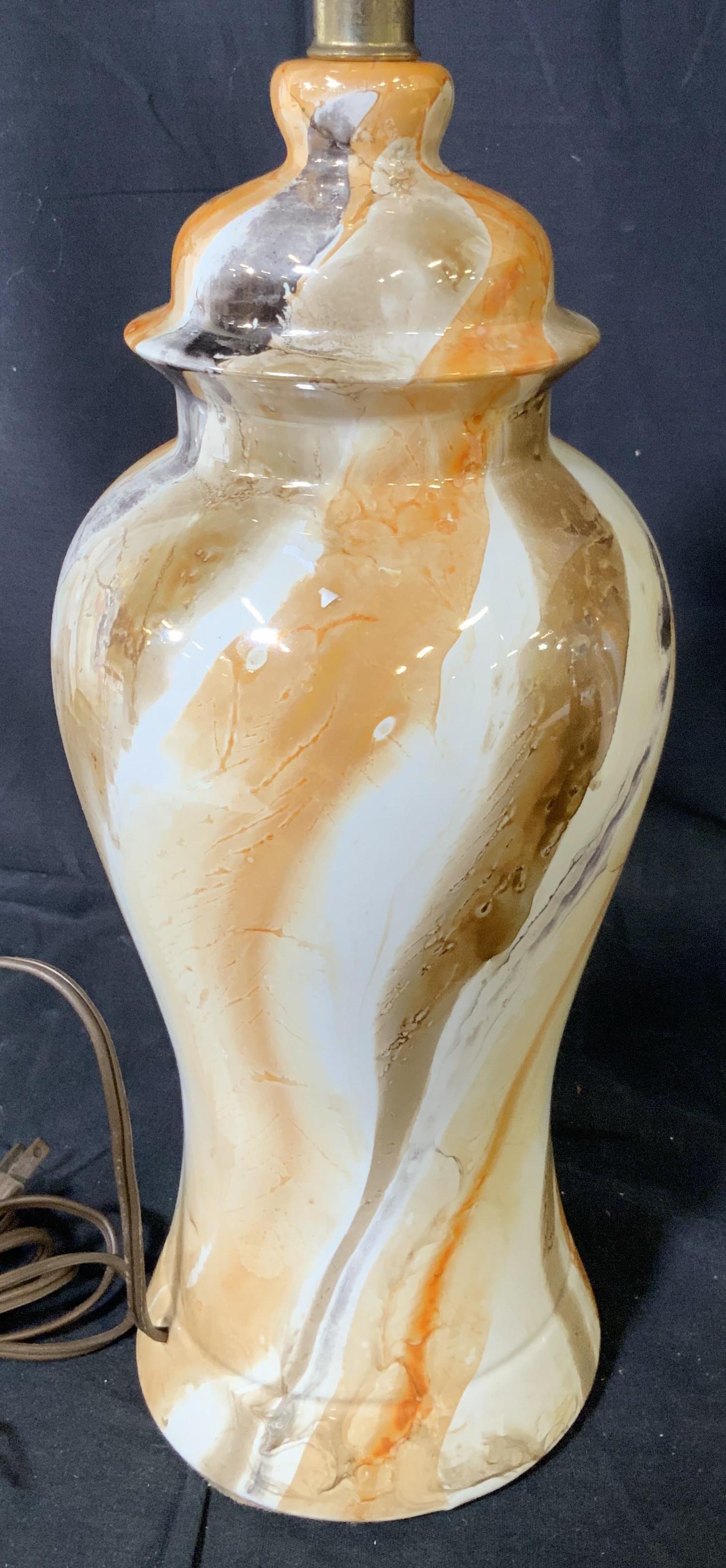 Pair Levitron MidCentury Vintage ginger Jar Lamps: Ginger jar shaped body, Pair of MidCentury Vintage swirl lamps, has three way bulb function, silk lined shades, and harps, lamps measures 26 inches tall without shade and 28 inches with the shade and 