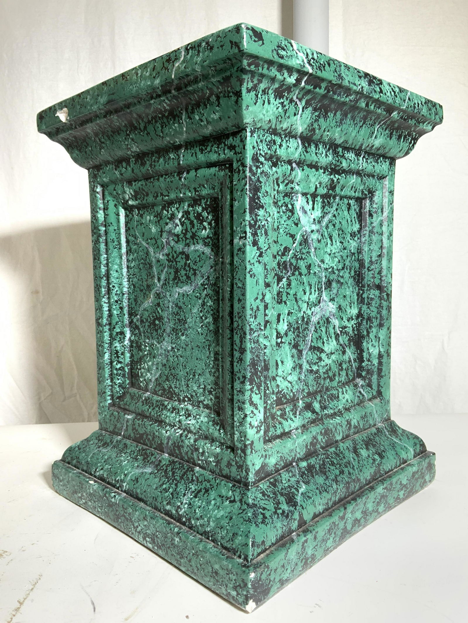 Faux Marbelized Plaster Pedestal W Texture Detail: Faux marbleized, faux malachite Pedestal has tones of green & Black. Top & base are square shaped. Pedestal, stand, plaster pedestal, plaster stand, green pedestal. home accent, home decor, Piece meas