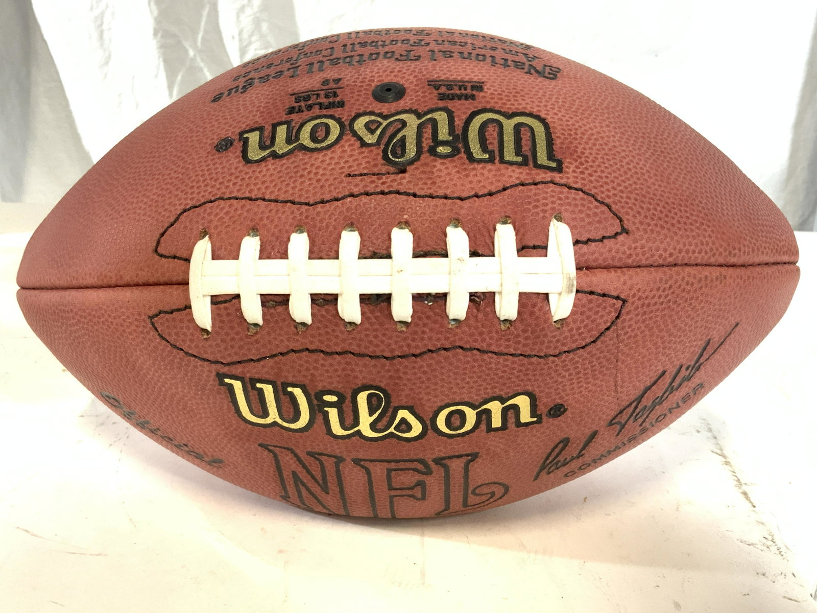 REGIS PHILBIN Notre Dame vs Navy Football: Football reads WILSON OFFICIAL NFL. Football appears to be vintage. Piece measures approx 11.5 inches long 6 inches wide. This item was generously donated by Regis Philbin’s family and was the prope