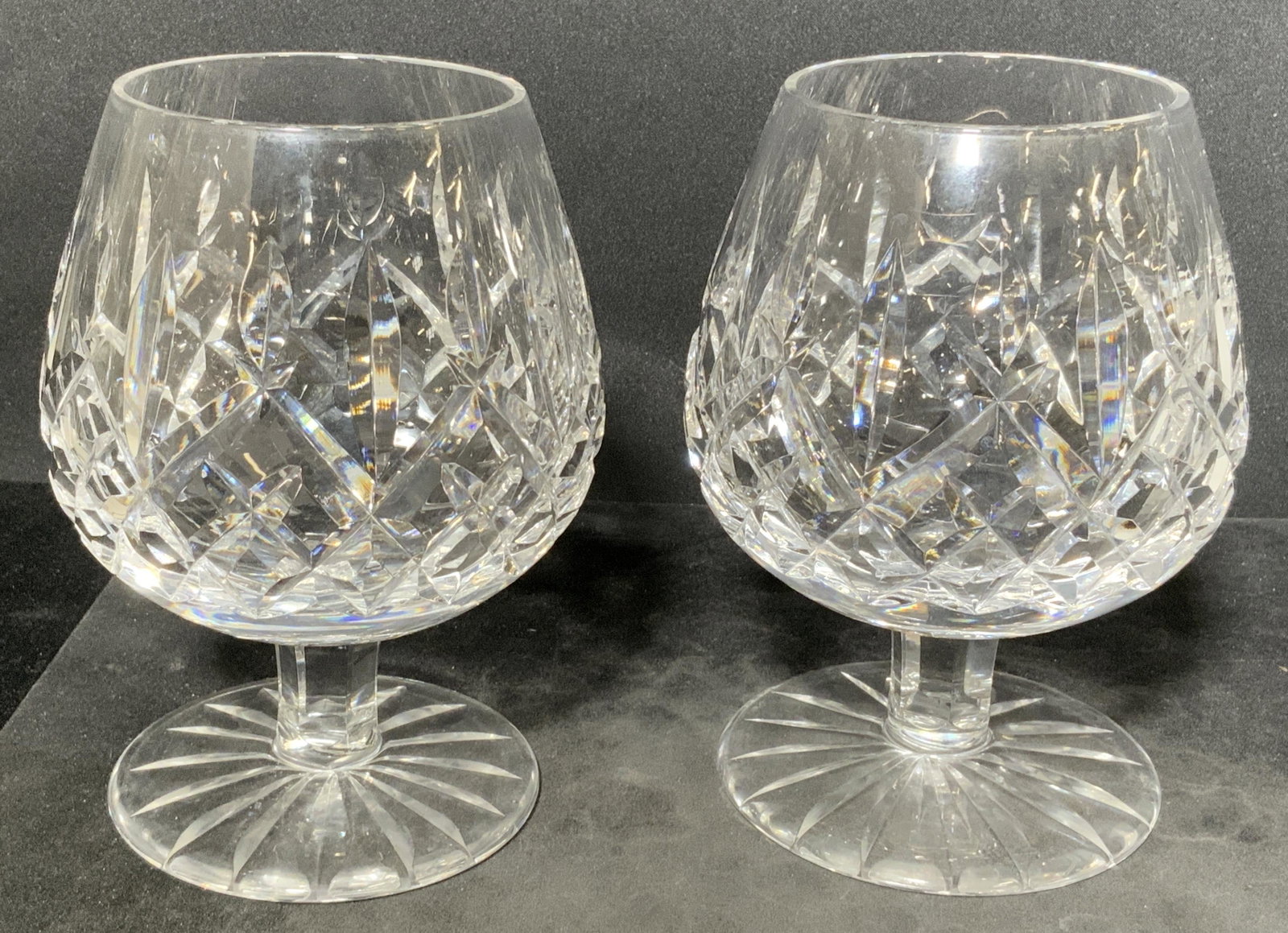 Pr WATERFORD Cut Crystal Stemware Brandy Sniffers: Undersides of brandy sniffer is marked WATERFORD. Each goblet is cut crystal. Each measures approx 8 inches tall 4.5 inches wide. Goblets, wine glasses, cognac glasses, Brady glasses, brandy sniffers,