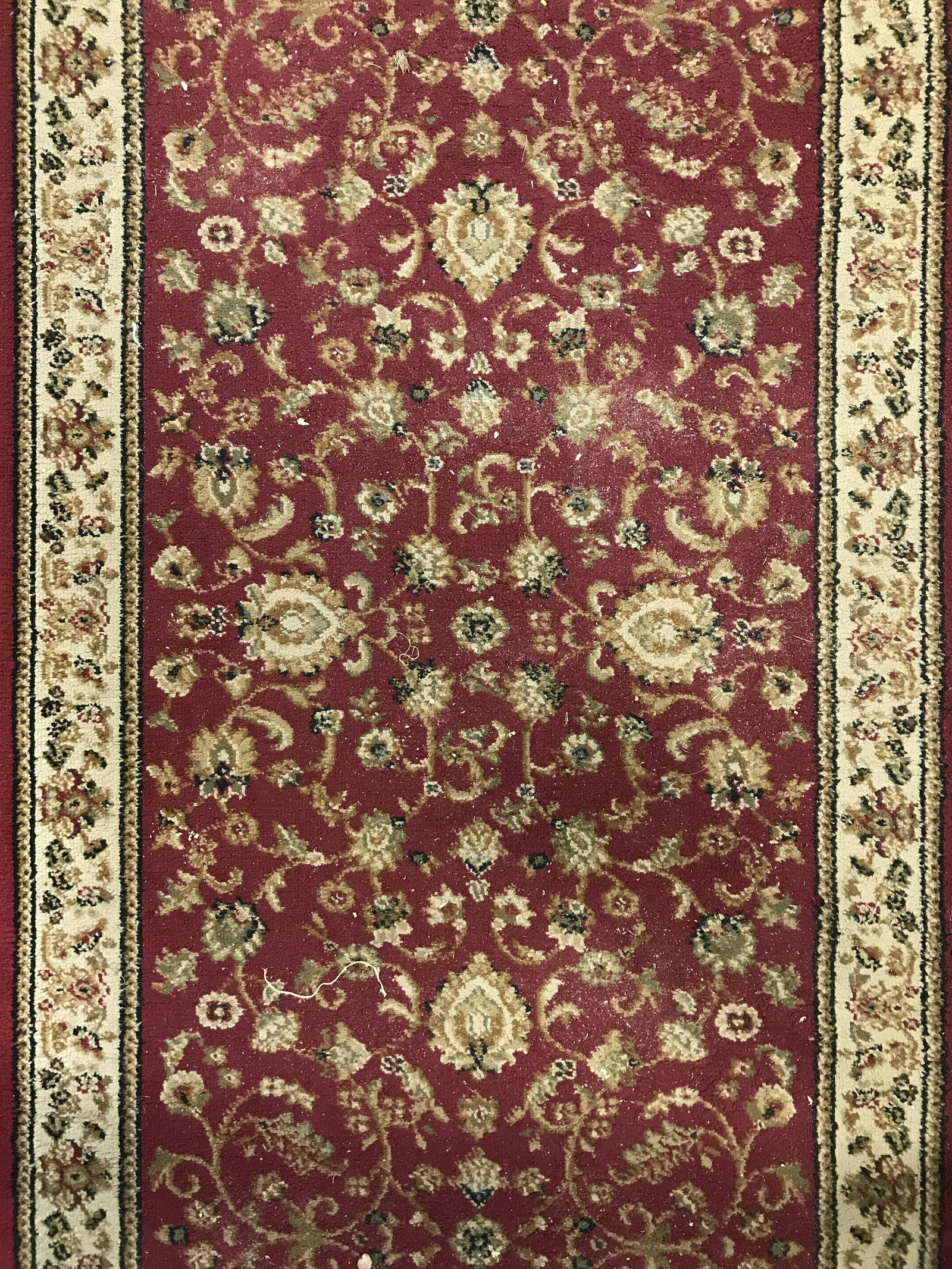 REGAL COLLECTION Turkish Runner: Underside reads REGAL COLLECTION AGRA MADE IN TURKEY. Rug is polypropylene. Piece contains multi toned floral vine & leaf detail. Piece measures approximately 9 feet 10 inches by 2 feet 7 inches. Runn
