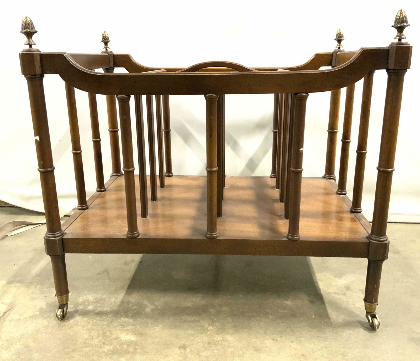 DREXEL WALLACE NUTTING Wooden Canterbury: Underside of piece is marked WALLACE NUTTING BY DREXEL. Canterbury is wooden. Contains 4 gold toned artichoke shaped finials which appear to be brass. Canterbury appears to be vintage. Piece sits on 4