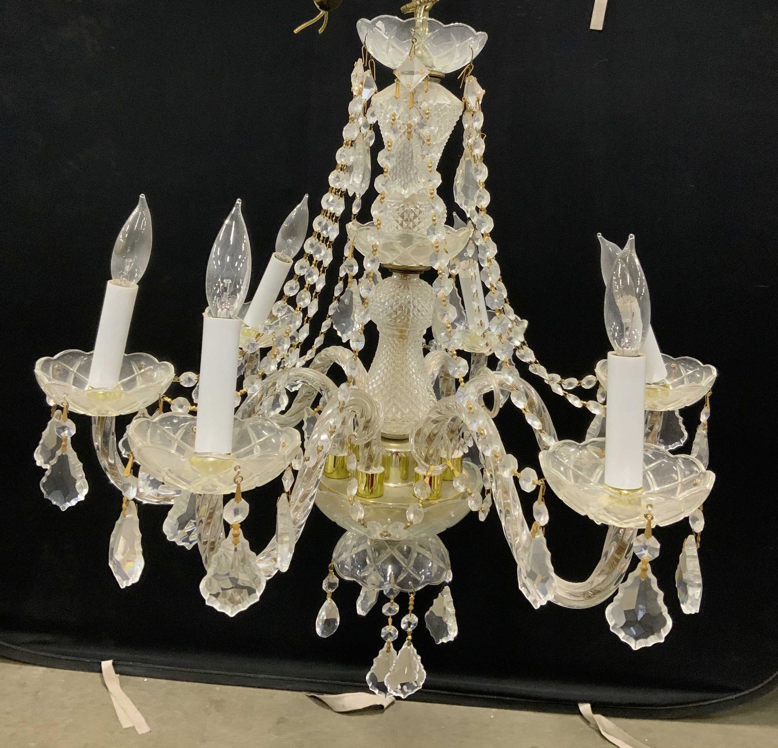 Vintage 6 Arm Crystal Chandelier W Shades, Prisms: Chandelier is vintage possibly antique. Piece has an assortment of variously shaped ornaments. Piece has 6 arms each with candlestick style bulb sockets. Chandelier Measures approximately 26 inches ta