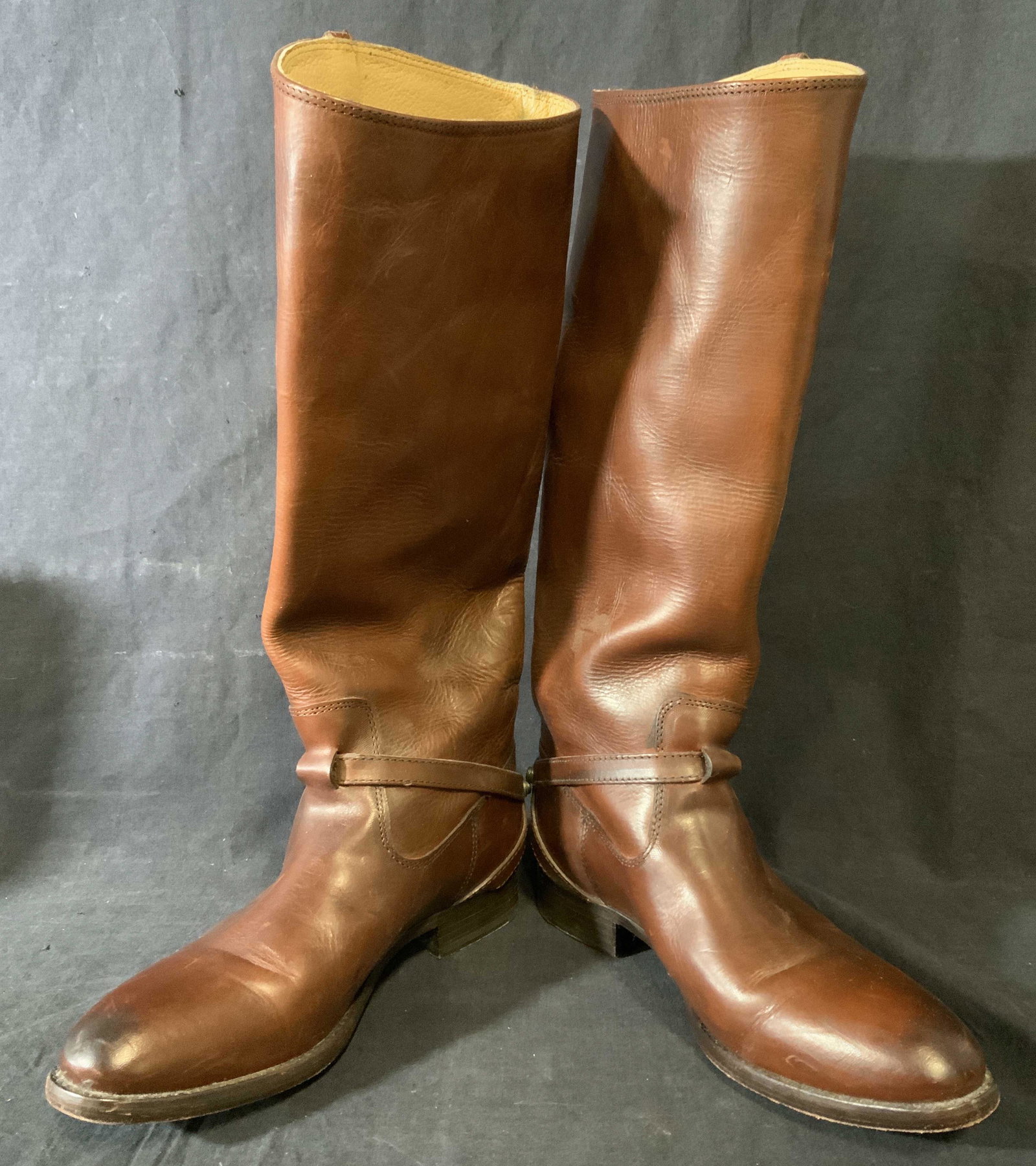 Pair THE FRYE COMPANY Leather Boots, Mexico: Pair of leather boots. Interior label, as well as boots heel read as THE FRYE COMPANY. Interior also reads as 7.5, MADE IN MEXICO, underside reads as THE FRYE COMPANY SINCE 1863. Each measures approx 